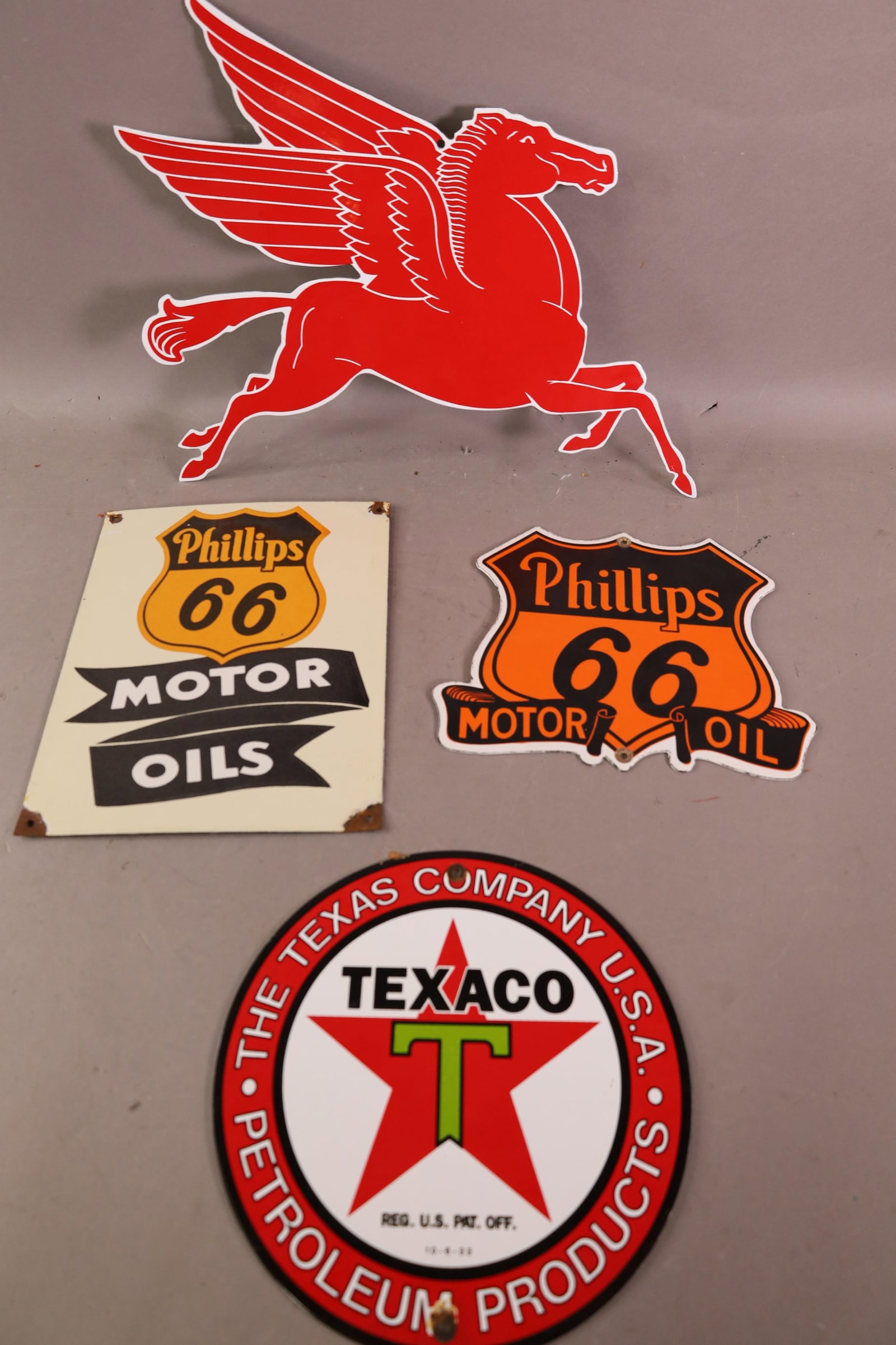 4 PORCELAIN SIGNS: REPRODUCTION GAS AND OIL SIGNS.