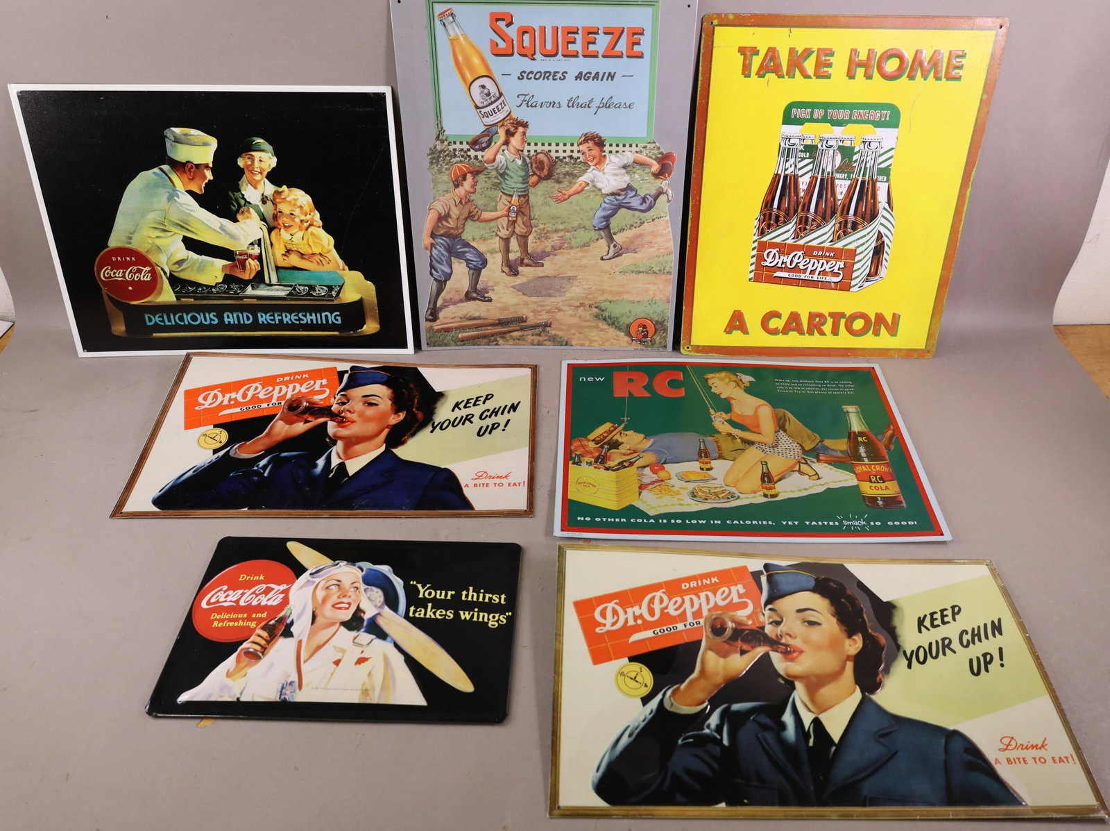 7 SODA SIGNS: REPRODUCTION TIN SODA SIGNS.