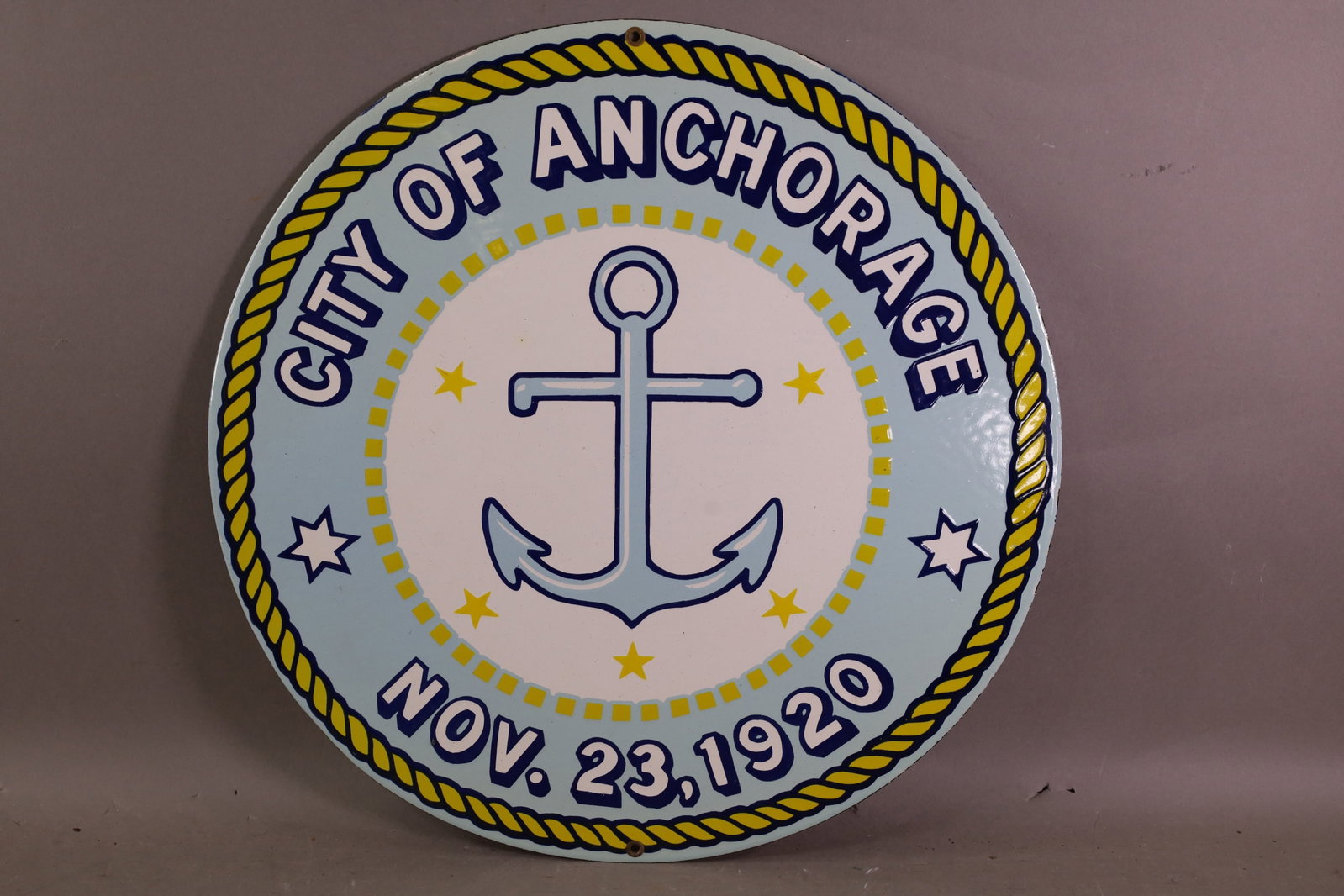 FANTASY CITY OF ANCHORAGE PORCELAIN SIGN: FANTASY SSP SIGN. 18" DIAM,