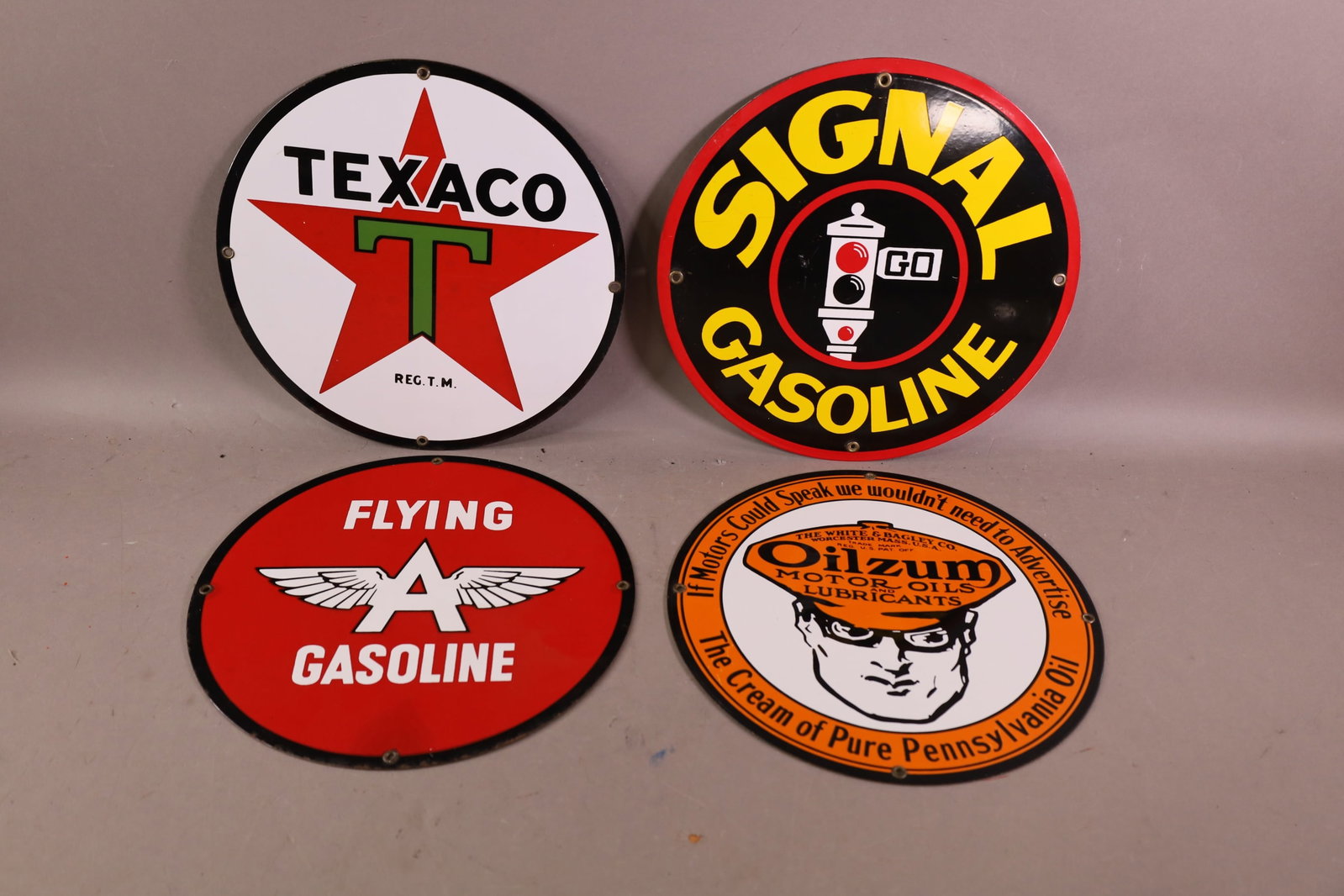4 REPRODUCTION PUMP PLATES: TEXACO, SIGNAL, FLYING A, OILZUM. 11 1/2" DIAM