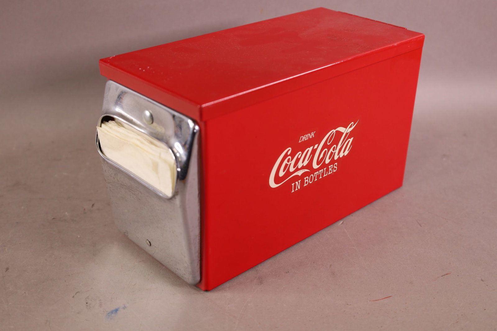 COCA COLA NAPKIN DISPENSER: STICKERED, HINGED LID. 6" H.