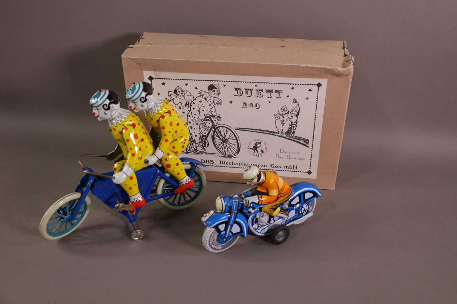 2 TIN LITHO MOTORCYCLES (1 of 3)