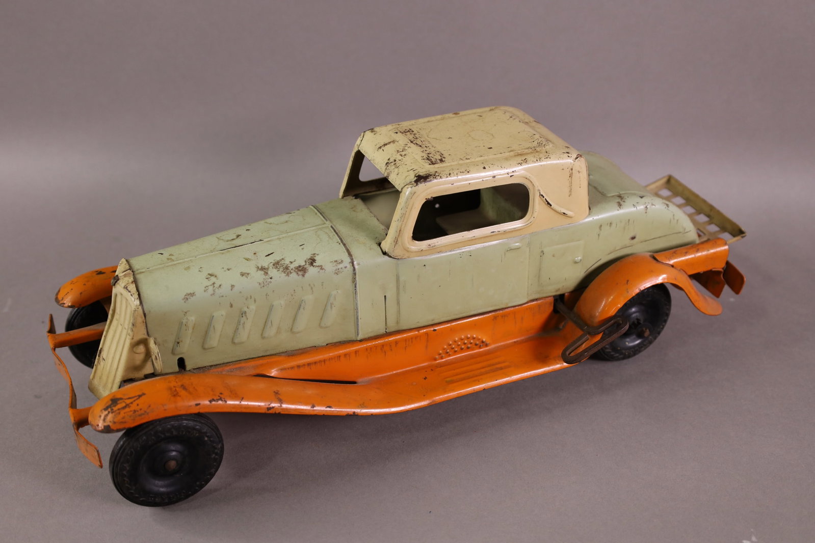 GIRARD WIND UP SEDAN: WIND UP PRESSED STEEL GIRARD SEDAN, REPAINT. SCRATCHES AND RUST. 14" L