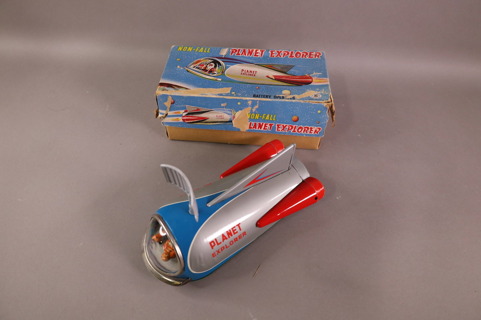 JAPANESE BATTERY OPERATED PLANET EXPLORER: ORIGINAL BOX, JAPANESE PLANET EXPLORER. DAMAGE TO BOX. 5 1/"2"