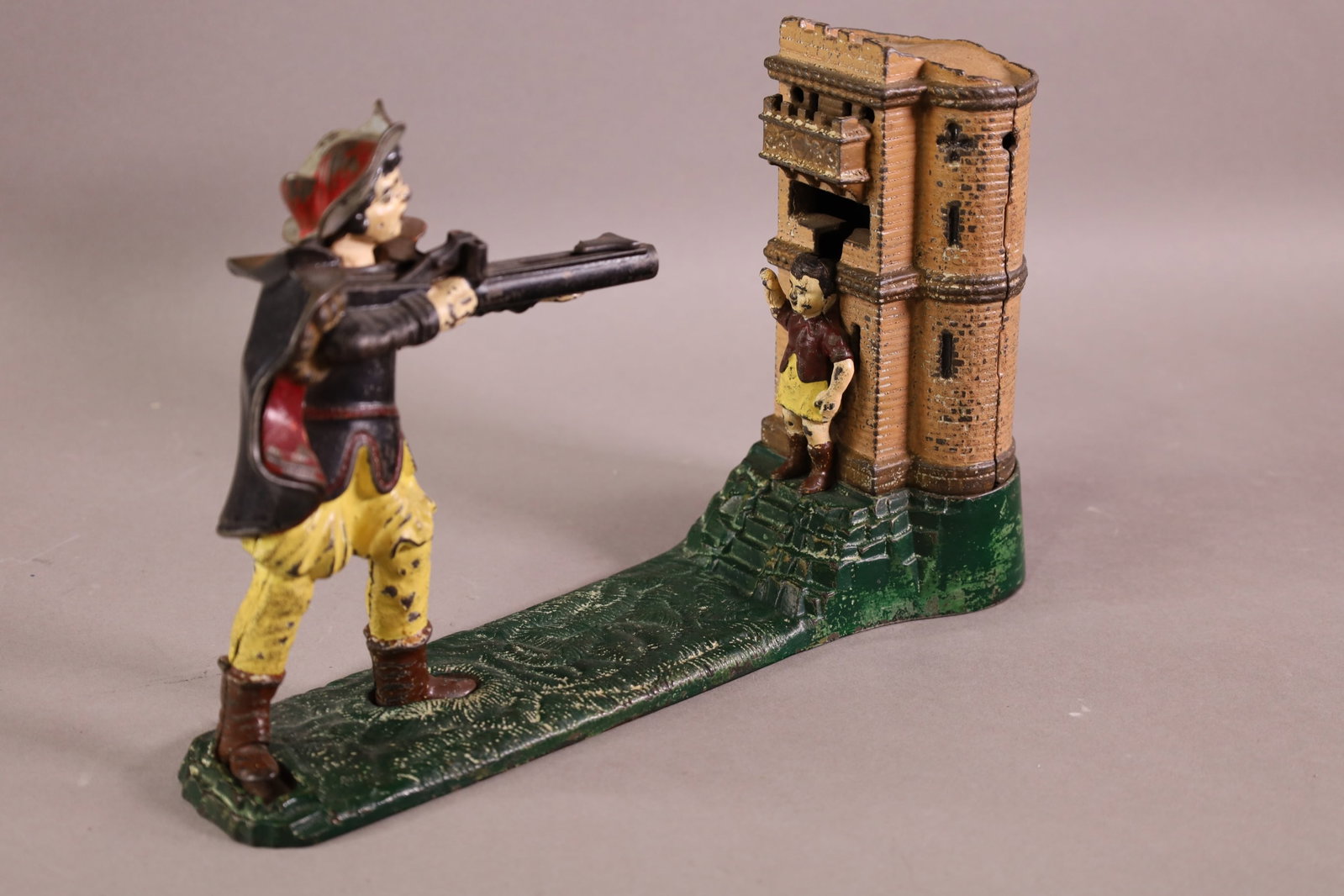 WILLIAM TELL CAST IRON BANK: CAST IRON MECHANICAL BANK, J&E STEVENS. 10" L x 7" H.