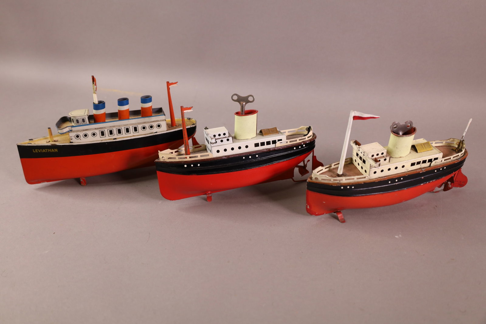 3 GERMAN TIN BOATS: WIND UP TIN BOATS. WITH 2 KEYS. 8" L