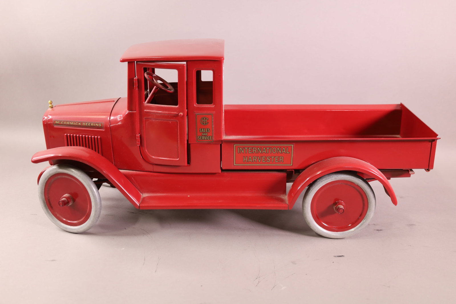 BUDDY L INTERNATIONAL HARVESTER PICK UP: MCCORMICK DEERING SALES AND SERVICE TRUCK MARKED T REPRODUCTION, 269/475. 24" L