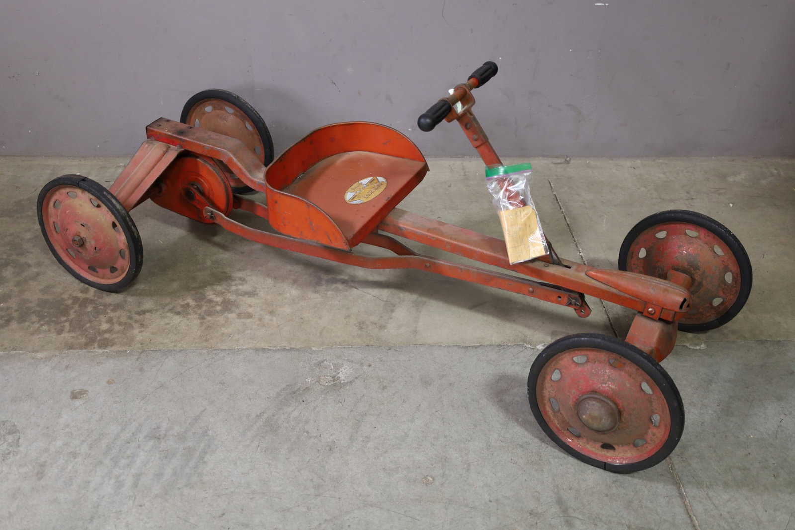 PARSONS IRISH MAIL: LARGE PARSONS IRISH MAIL, RIDING TOY. 48" L x 18" W. THIS ITEM EXCEEDS SIZE, WEIGHT, AND OR FRAGILITY LIMITATIONS FOR IN HOUSE SHIPPING, MUST BE PICKED UP IN HOUSE OR SHIPPED VIA 3RD PARTY SHIPPER.