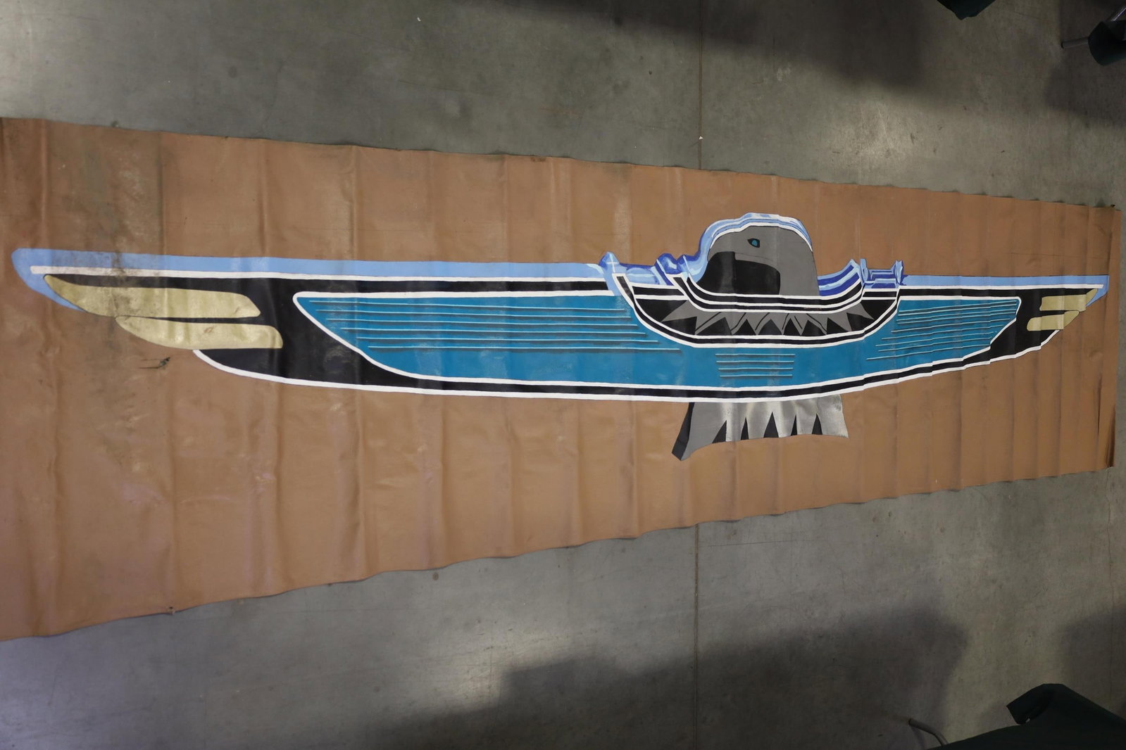 HUGE THUNDERBIRD BANNER: HAND PAINTED BANNER OF THUNDERBIRD. HOLES. NEEDS CLEANED. ODOR. 170" x 42"