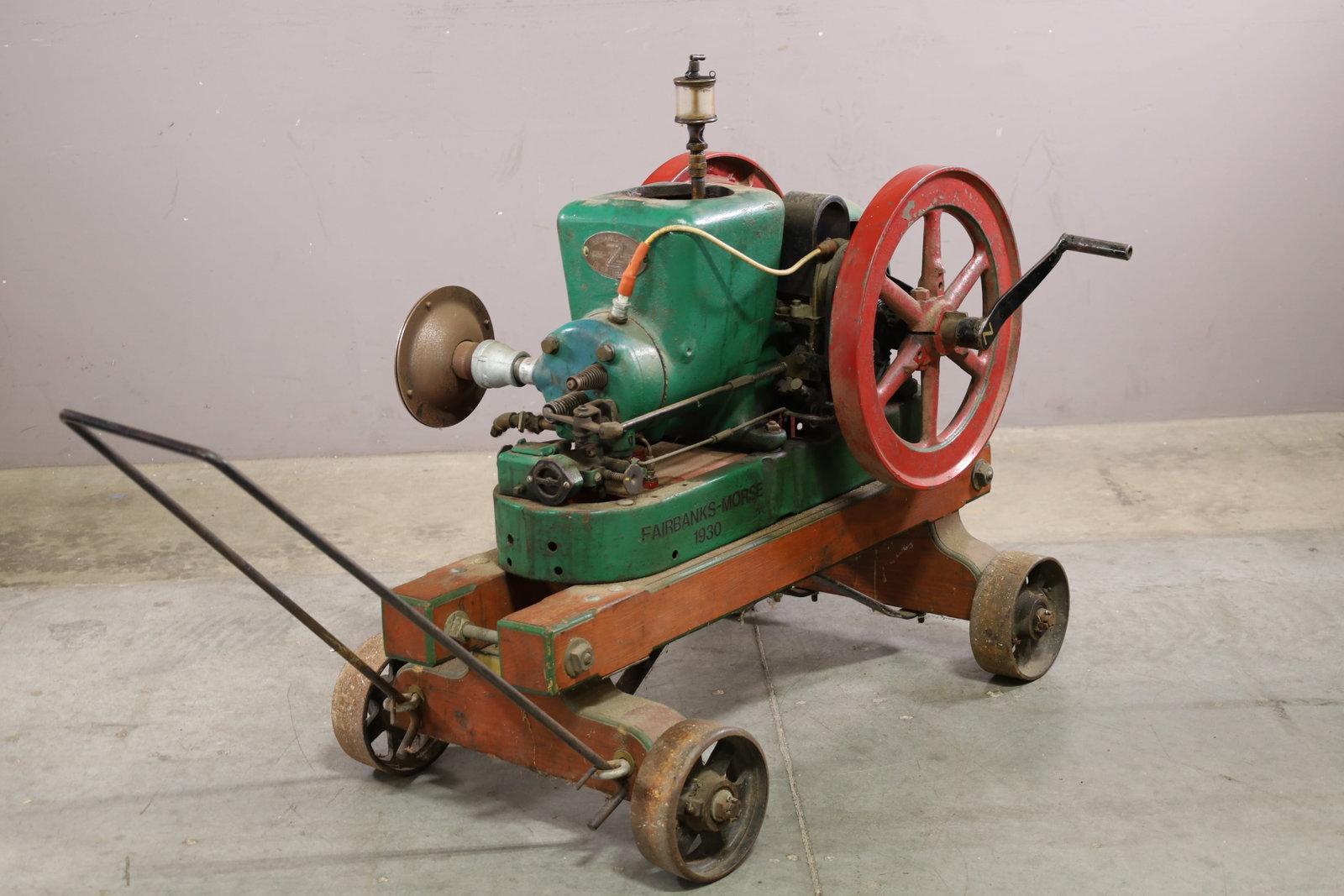 FAIRBANKS MORSE HIT & MISS MOTOR: LARGE ANTIQUE FAIRBANKS MORSE, 2 HP, 600 RPM. HIT AND MISS MOTOR. OLD RESTORATION, UNKNOWN WORKING ORDER. UNTESTED. 36" L x 23" W x 36" H. THIS ITEM EXCEEDS SIZE, WEIGHT, AND OR FRAGILITY LIMITATIONS