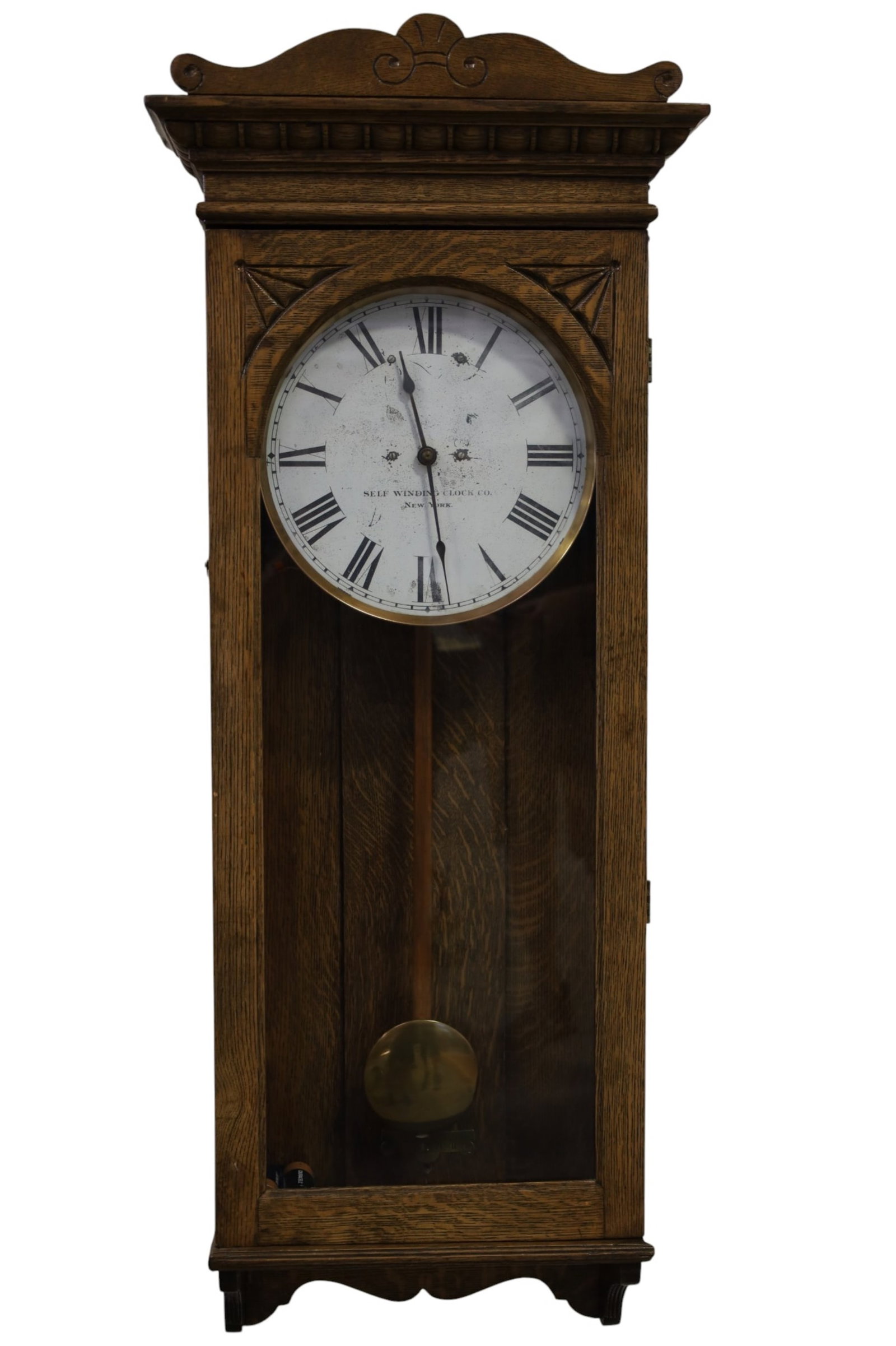 SELF WINDING CLOCK CO. WALL CLOCK: OAK CASED, SELF WINDING CLOCK CO. WALL CLOCK, SCRATCHES AND PAINT LOSS TO DIAL. 48" H. ALL CLOCKS ARE SOLD AS IS WE DO NOT GUARANTEE WORKING ORDER. THIS ITEM EXCEEDS SIZE, WEIGHT, AND OR FRAGILITY LIM