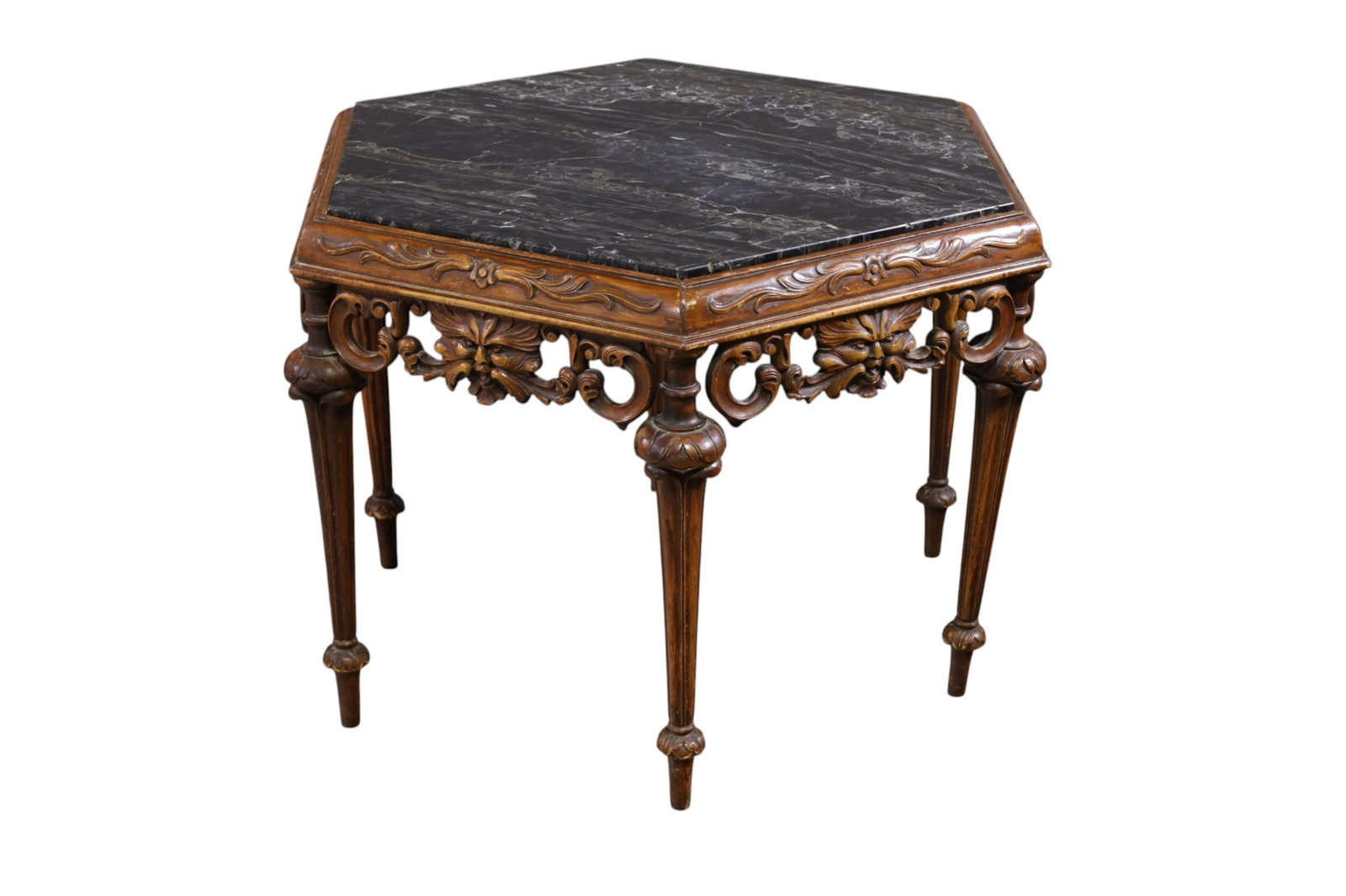 1920'S OCTAGON MARBLE TOP TABLE: CARVED BASE, OCTAGON TOP MARBLE TOP END TABLE. 27" W x 20" H. THIS ITEM EXCEEDS SIZE, WEIGHT, AND OR FRAGILITY LIMITATIONS FOR IN HOUSE SHIPPING, MUST BE PICKED UP IN HOUSE OR SHIPPED VIA 3RD PARTY SH