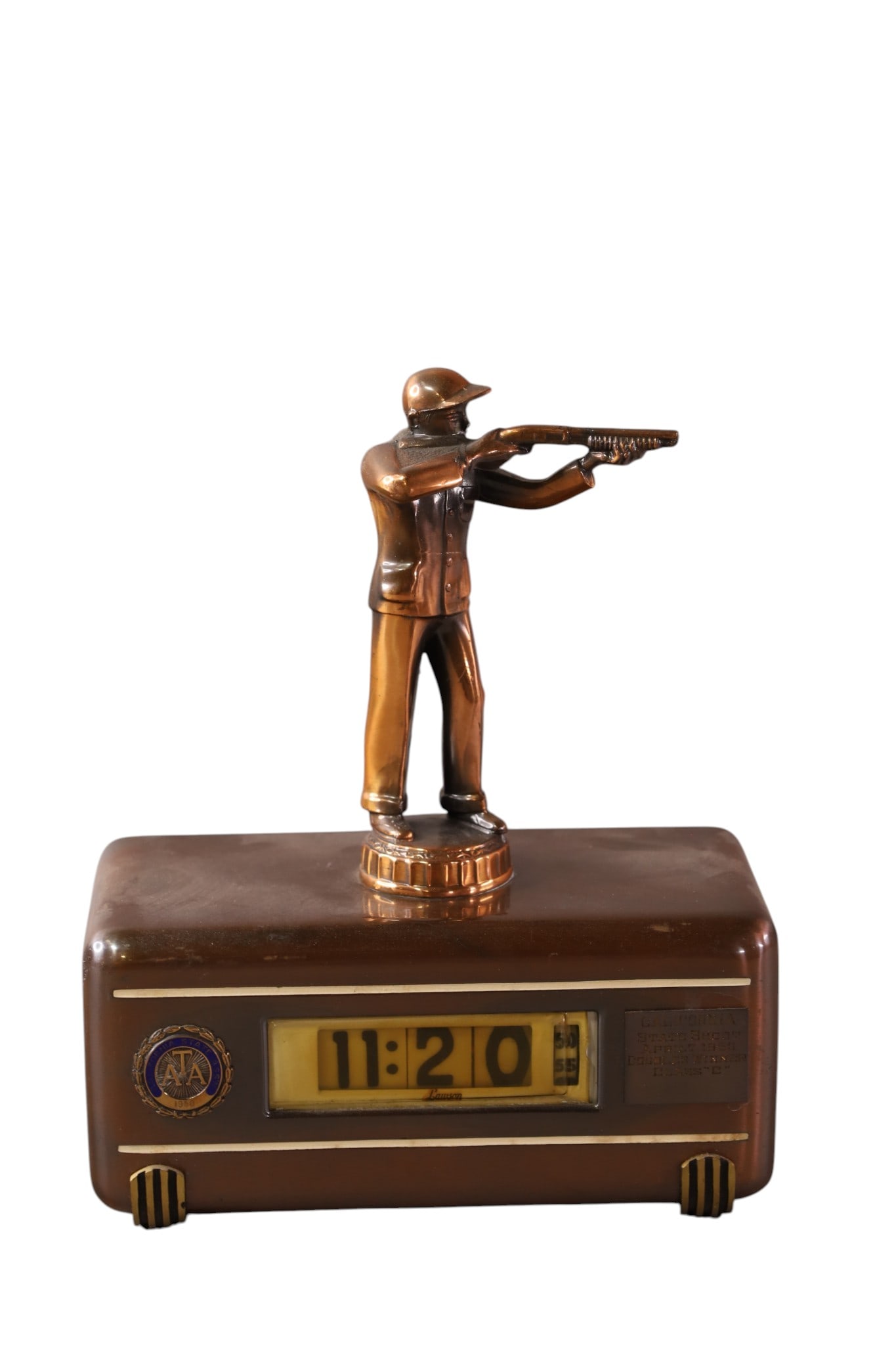 1950'S SHELF CLOCK W/ RIFLEMAN: LAWSON ELECTRIC CLOCK, MODEL 311, 1950s SHOOTING TROPHY. 7" W x 9" H.