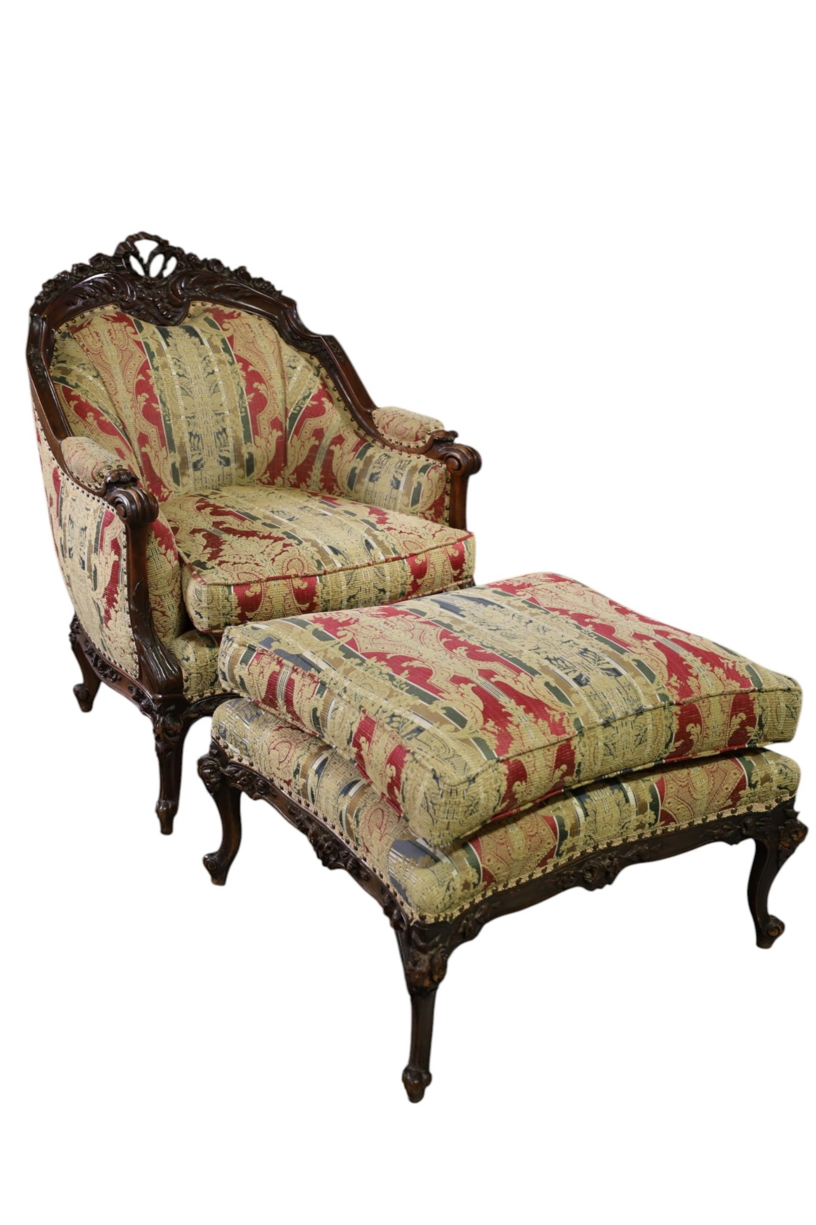 VICTORIAN CHAIR & OTTOMAN: HIGHLY CARVED VICTORIAN ROCOCO STYLE CHAIR AND OTTOMAN, REUPHOLSTERED. 31" W x 35" D x 40" H. & 30" W x 26" D x 21" H. THIS ITEM EXCEEDS SIZE, WEIGHT, AND OR FRAGILITY LIMITATIONS FOR IN HOUSE