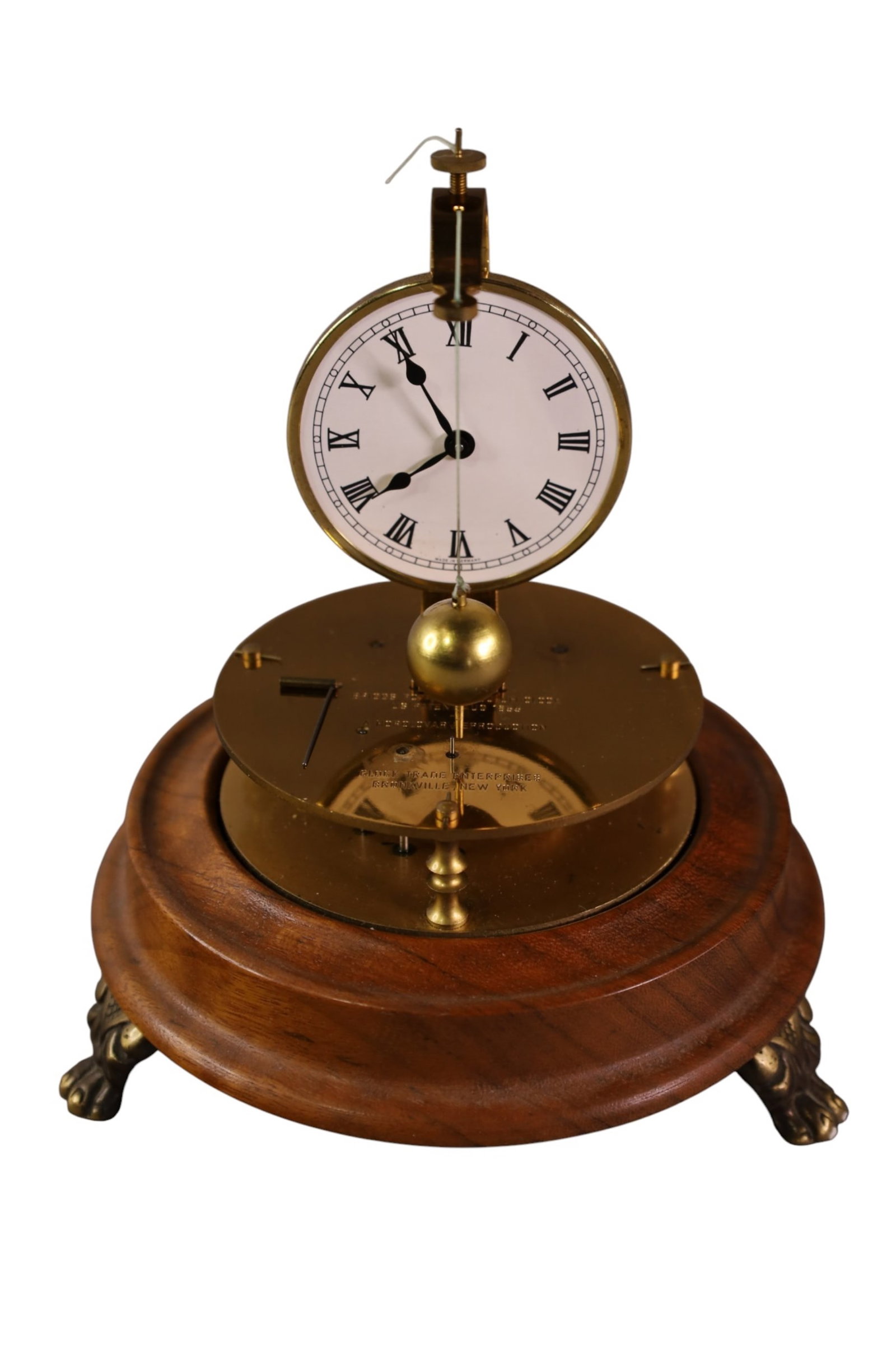 BRIGGS ROTARY CLOCK: ROTARY CLOCK IN GLASS DOME, GERMAN MADE ROTARY PENDULUM CLOCK. ALL CLOCKS ARE SOLD AS IS WE DO NOT GUARANTEE WORKING ORDER. 7" H.