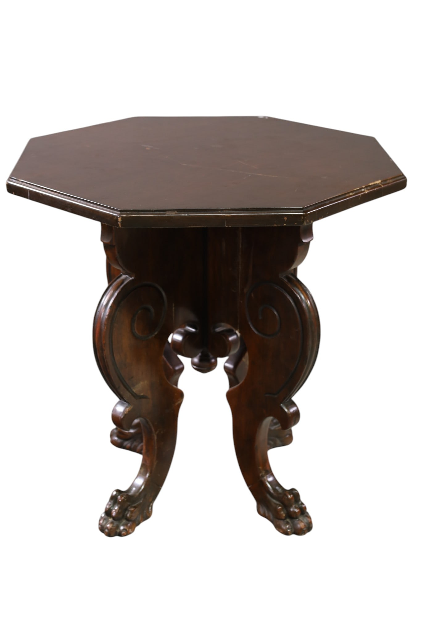 1920'S WALNUT SIDE TABLE: CARVED WALNUT SIDE TABLE, CLAW FOOT. WEAR TO FINISH. 24" x 24" THIS ITEM EXCEEDS SIZE, WEIGHT, AND OR FRAGILITY LIMITATIONS FOR IN HOUSE SHIPPING, MUST BE PICKED UP IN HOUSE OR SHIPPED VIA 3RD PARTY