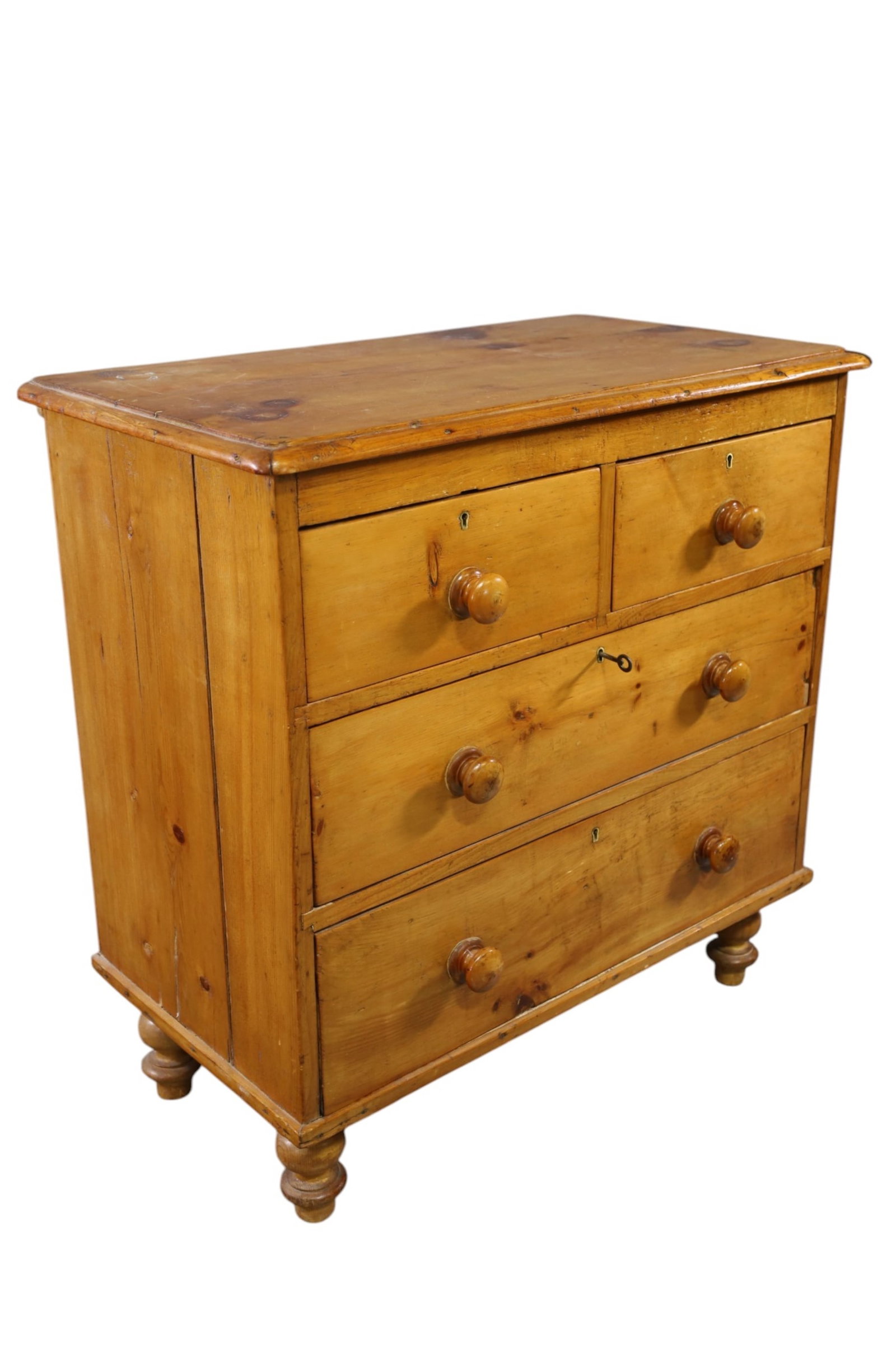 PRIMITIVE PINE CHEST: 4 DRAWER PRIMITIVE PINE CHEST, WITH KEY. 33 1/2" W x 18 1/2" D x 34" H. THIS ITEM EXCEEDS SIZE, WEIGHT, AND OR FRAGILITY LIMITATIONS FOR IN HOUSE SHIPPING, MUST BE PICKED UP IN HOUSE OR SHIPPED VIA