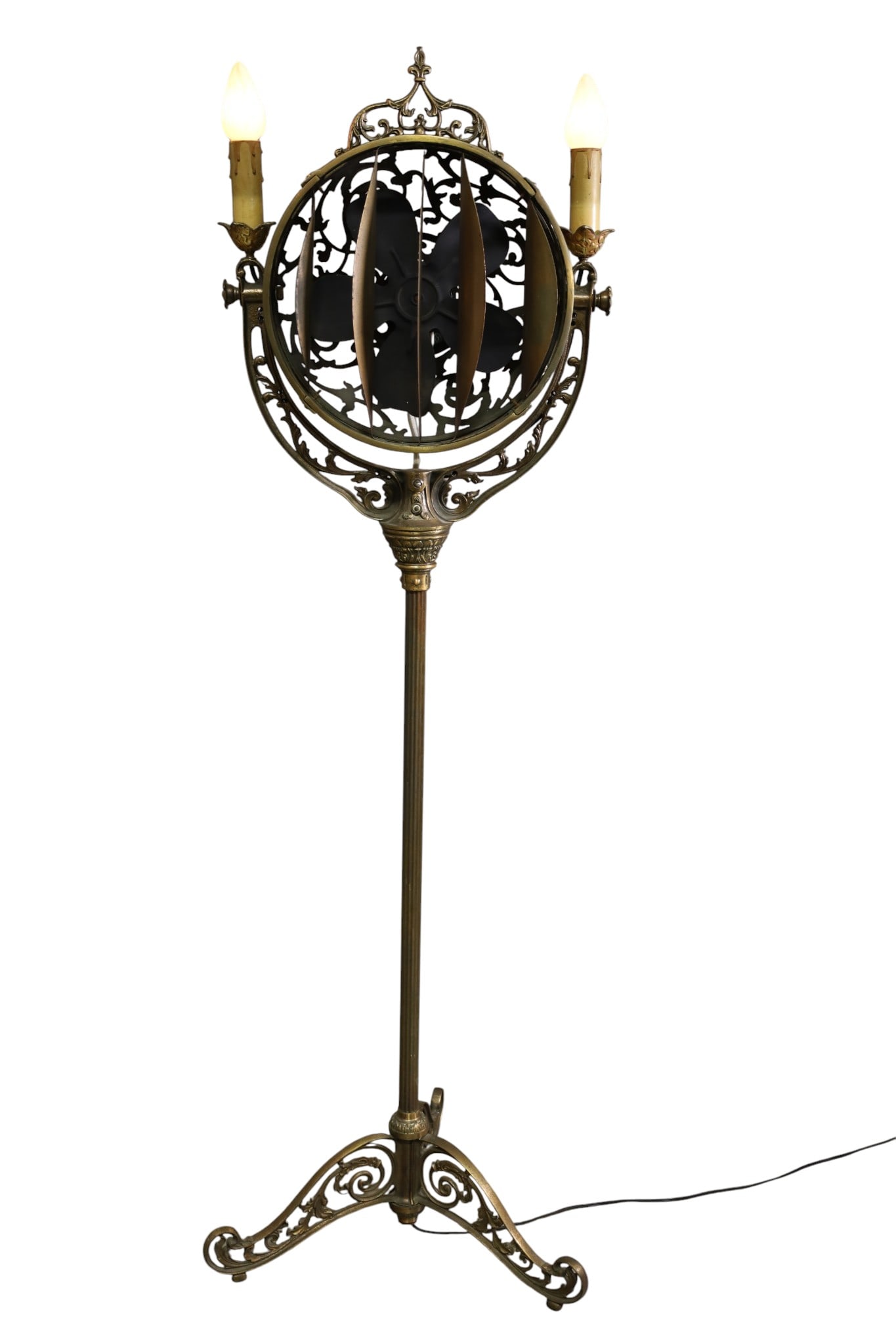 ANTIQUE ORNATE FUNERAL FAN: ANTIQUE FUNERAL FAN WITH DOUBLE SOCKET LIGHTS. ORNATE FUNERAL FAN, MARKED LUMINAIRE. REPAIRED BACK, WORKS. 18" W x 59" H. THIS ITEM EXCEEDS SIZE, WEIGHT, AND OR FRAGILITY LIMITATIONS FOR IN HOUSE