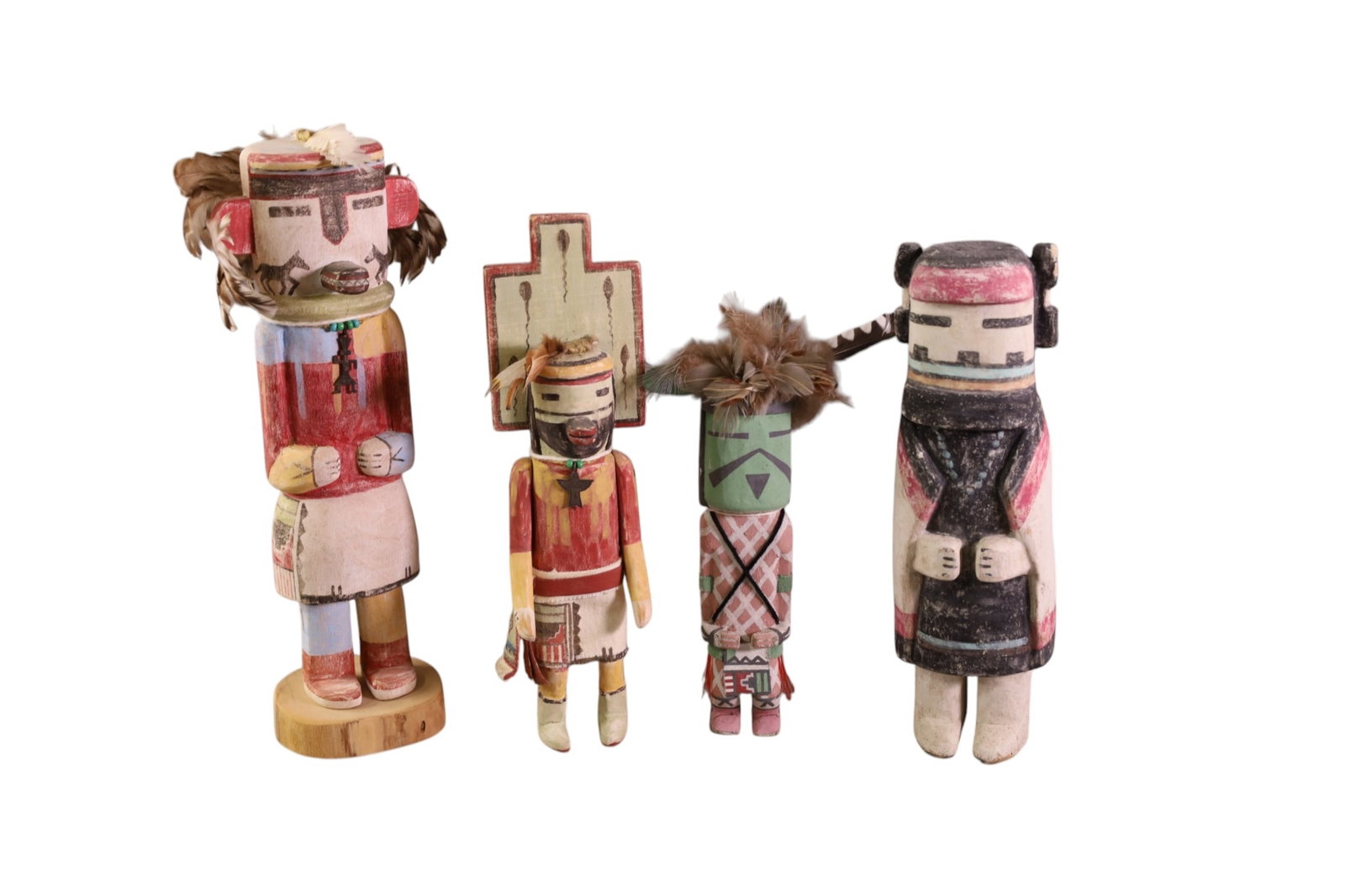 4 KACHINAS: UNSIGNED HOPI KACHINAS, HAND PAINTED WITH FEATHERS. 9" - 12 1/2" H