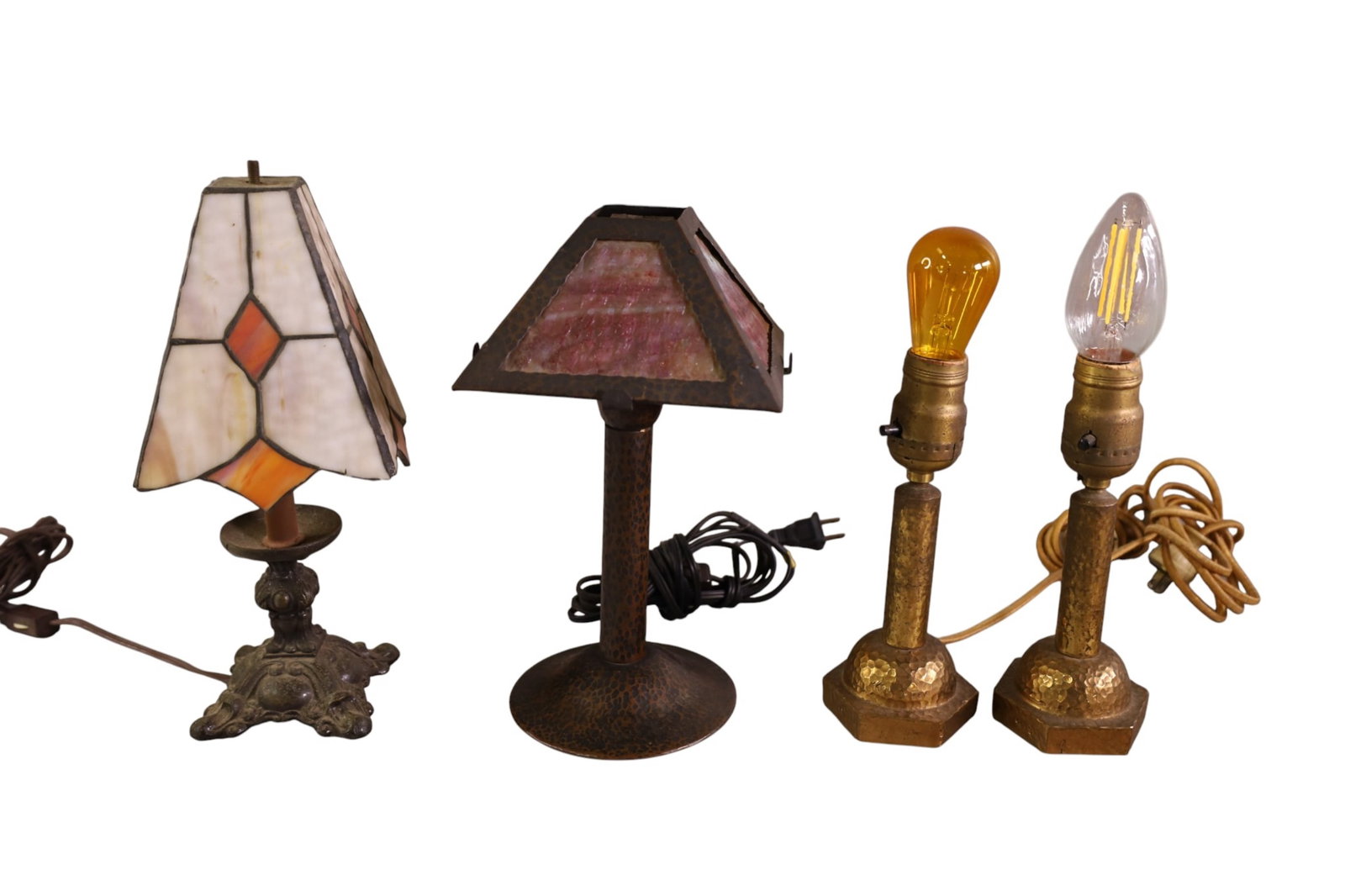 4 SMALL LAMPS: HAND POUNDED COPPER, & SMALL TABLE LAMPS WITH SLAG SHADES. BREAK TO ONE PANEL. 8" - 12" H.