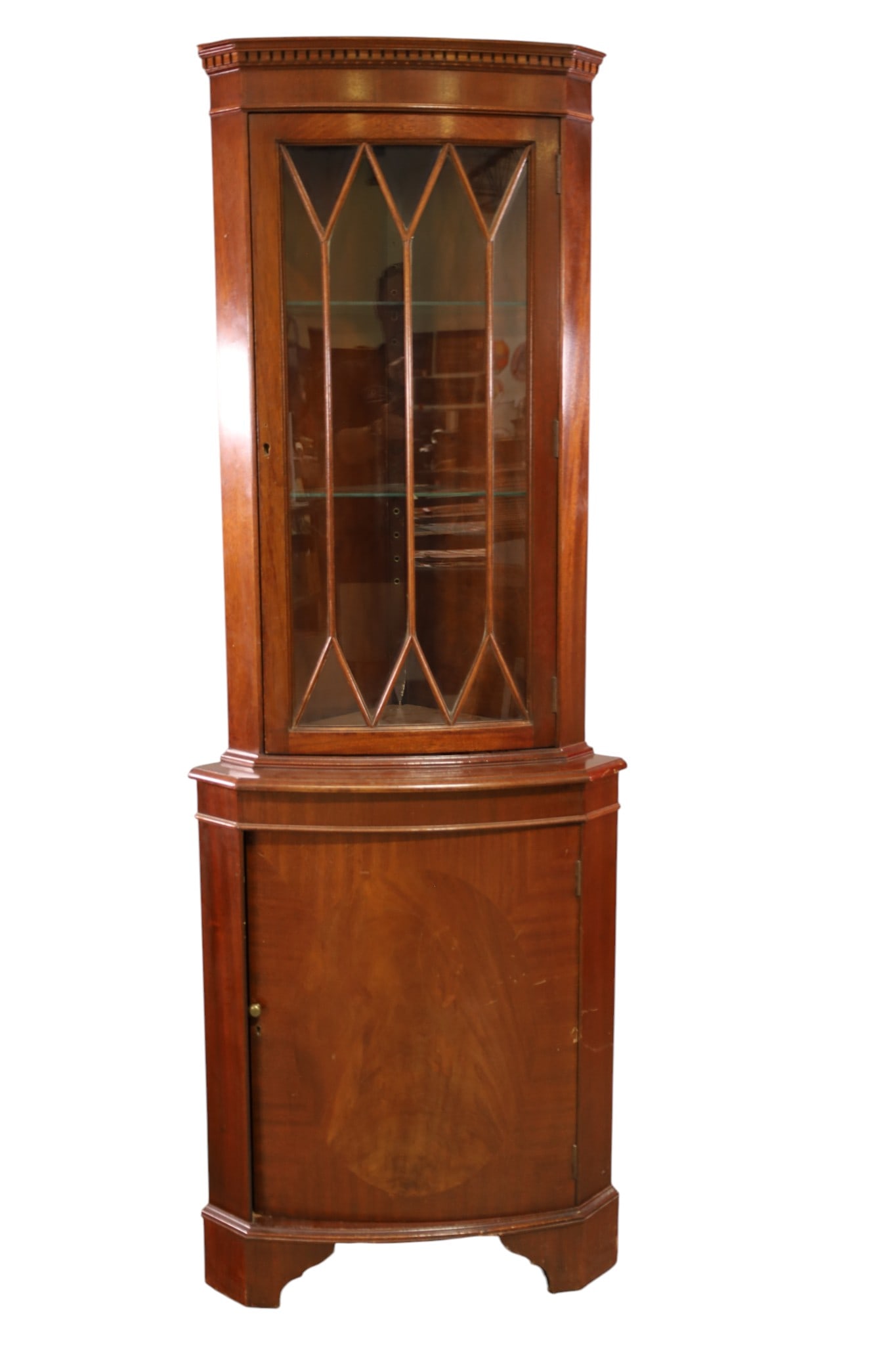NARROW MAHOGANY CORNER CABINET: SINGLE DOOR MAHOGANY CORNER CABINET, LOWER DOOR. INTERIOR GLASS SHELVES. 26" W x 17" D x 72" H. THIS ITEM EXCEEDS SIZE, WEIGHT, AND OR FRAGILITY LIMITATIONS FOR IN HOUSE SHIPPING, MUST BE PICKED UP