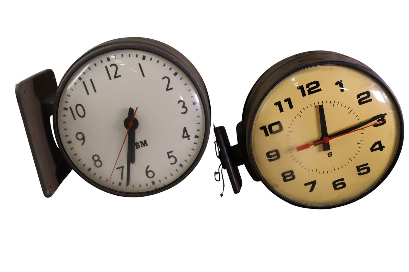 2 SCHOOL CLOCKS: 2 SCHOOL OR FACTORY WALL MOUNT DOUBLE SIDED CLOCKS. 1 IS IBM. CASES ARE LOOSE. UNTESTED. 13" DIAM.