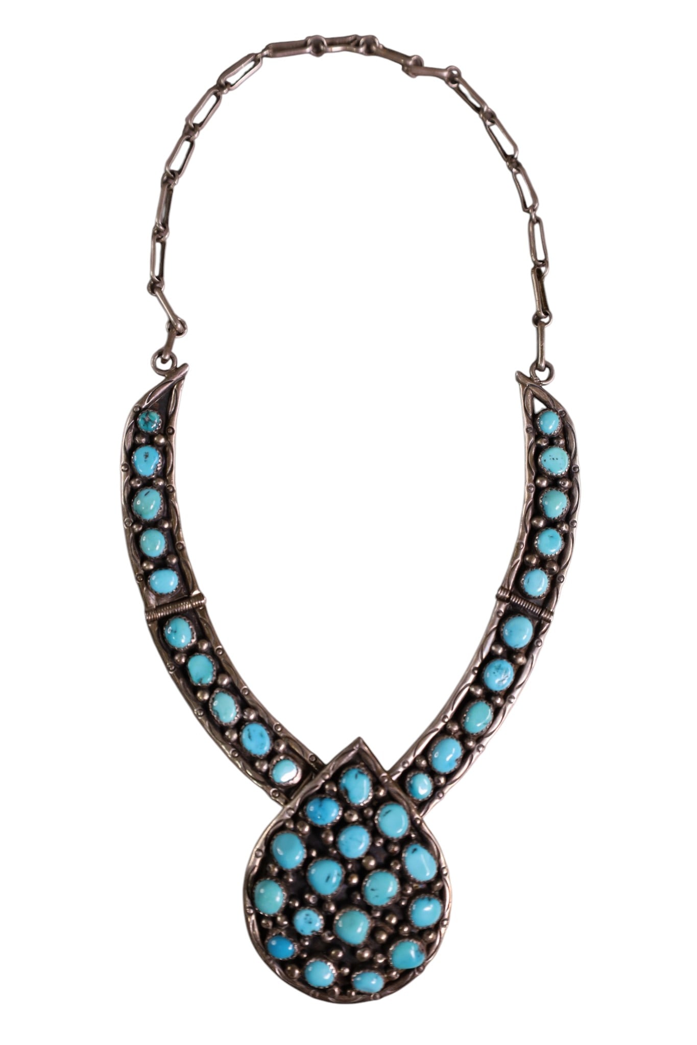 NATIVE AMERCIAN SQUASH BLOSSOM: NATIVE AMERICAN, STERLING AND TURQUOISE CLUSTER SQUASH BLOSSOM SIGNED, R.M. .17" L