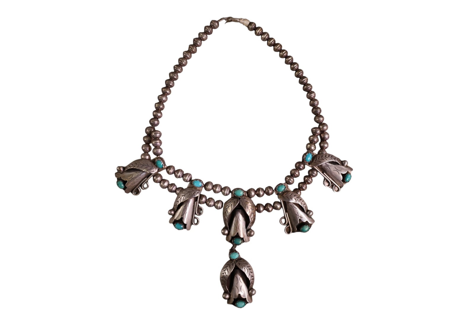 NAVAJO SQUASH BLOSSOM: CRESCENT SHAPED SQUAD BLOSSOM, SILVER AND TURQUOISE. 14" L.