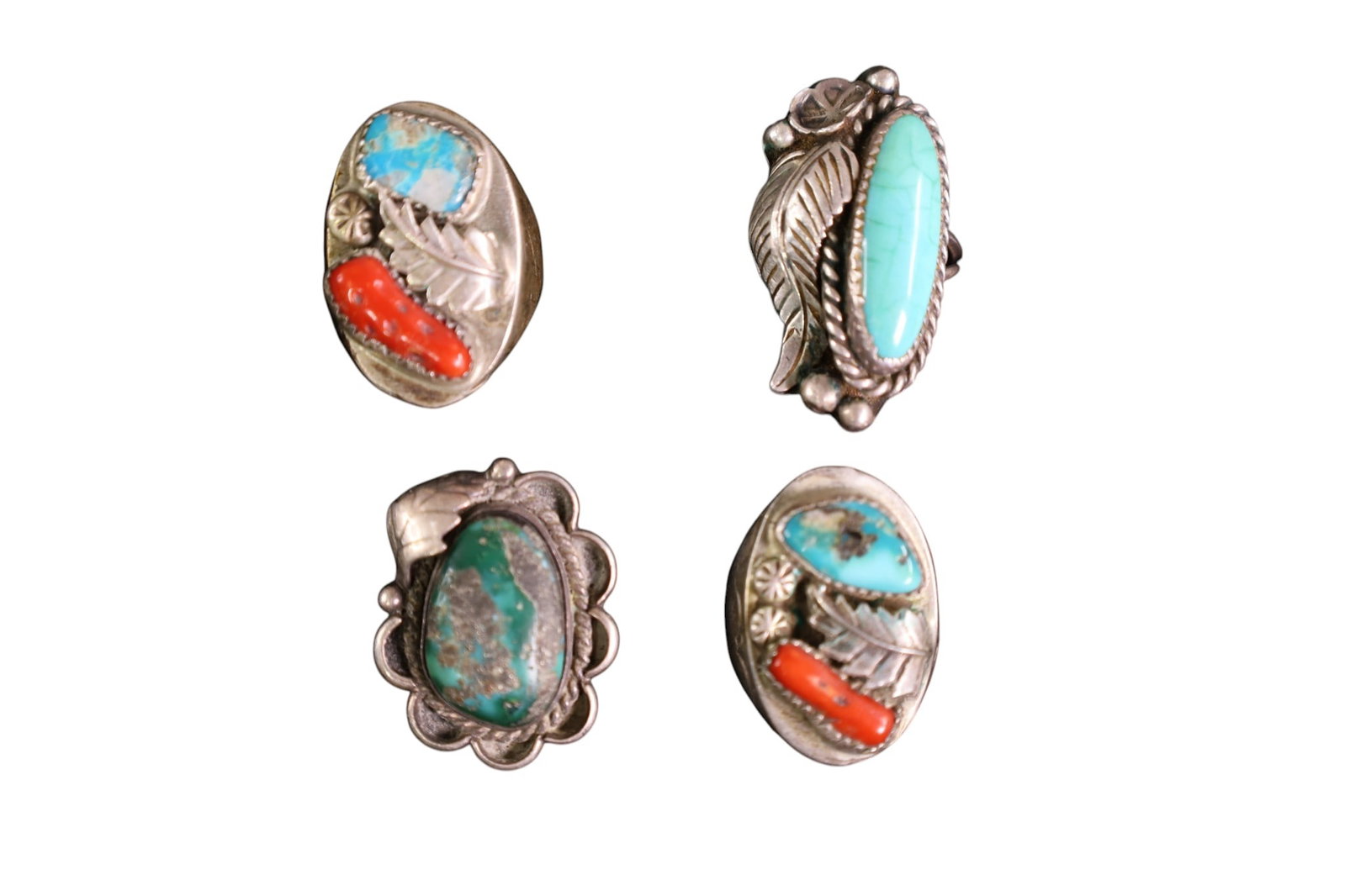 4 NAVAJO RINGS: 2 SILVER AND CORAL AND TURQUOISE RINGS, 10 & 11. & SILVER AND TURQUOISE, 8. 5 & 7.