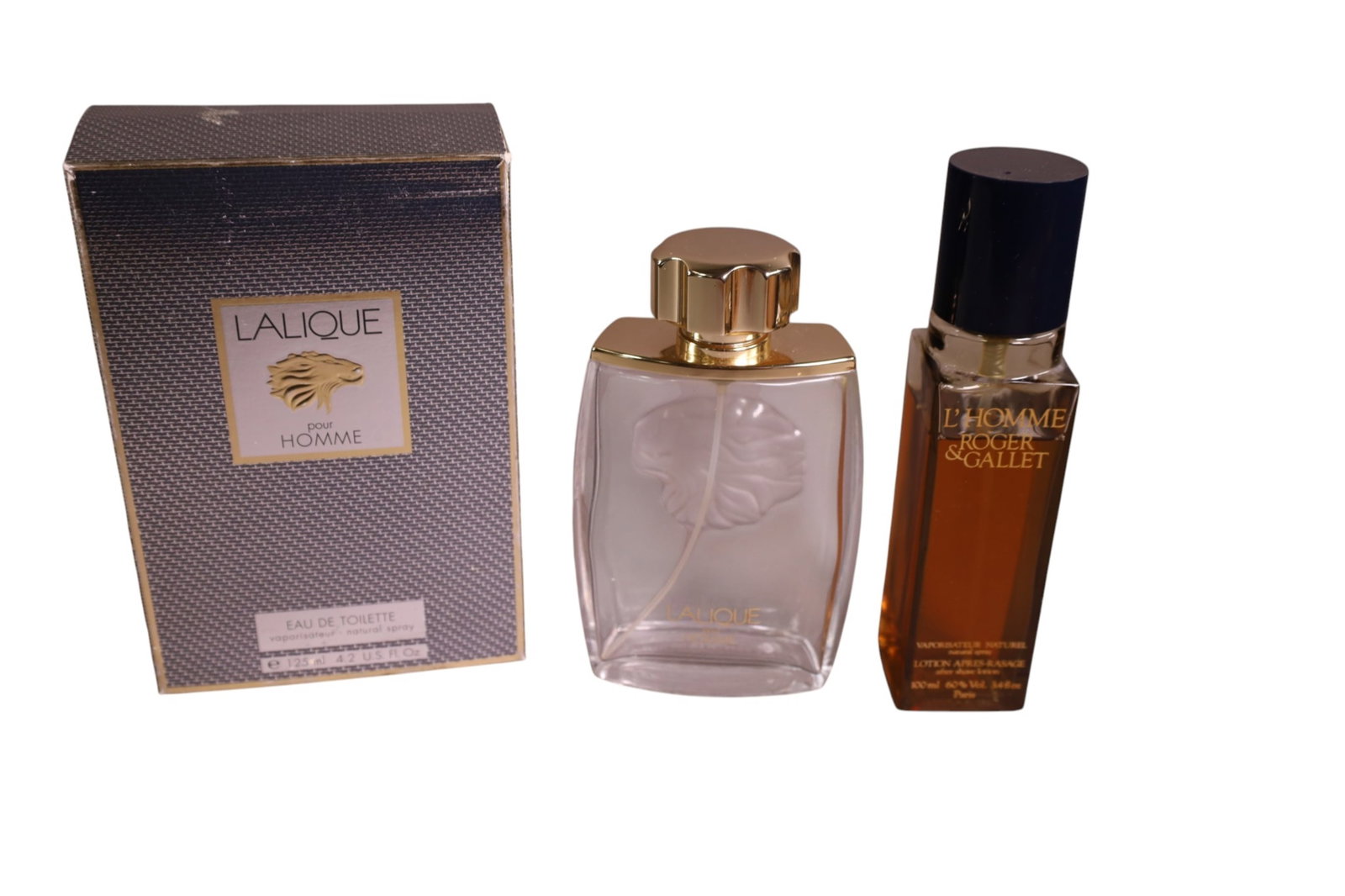 2 PERFUME BOTTLES: LALIQUE HOMME PERFUME IN ORIGINAL BOX, & ROGER AND GALLET. PERFUME.
