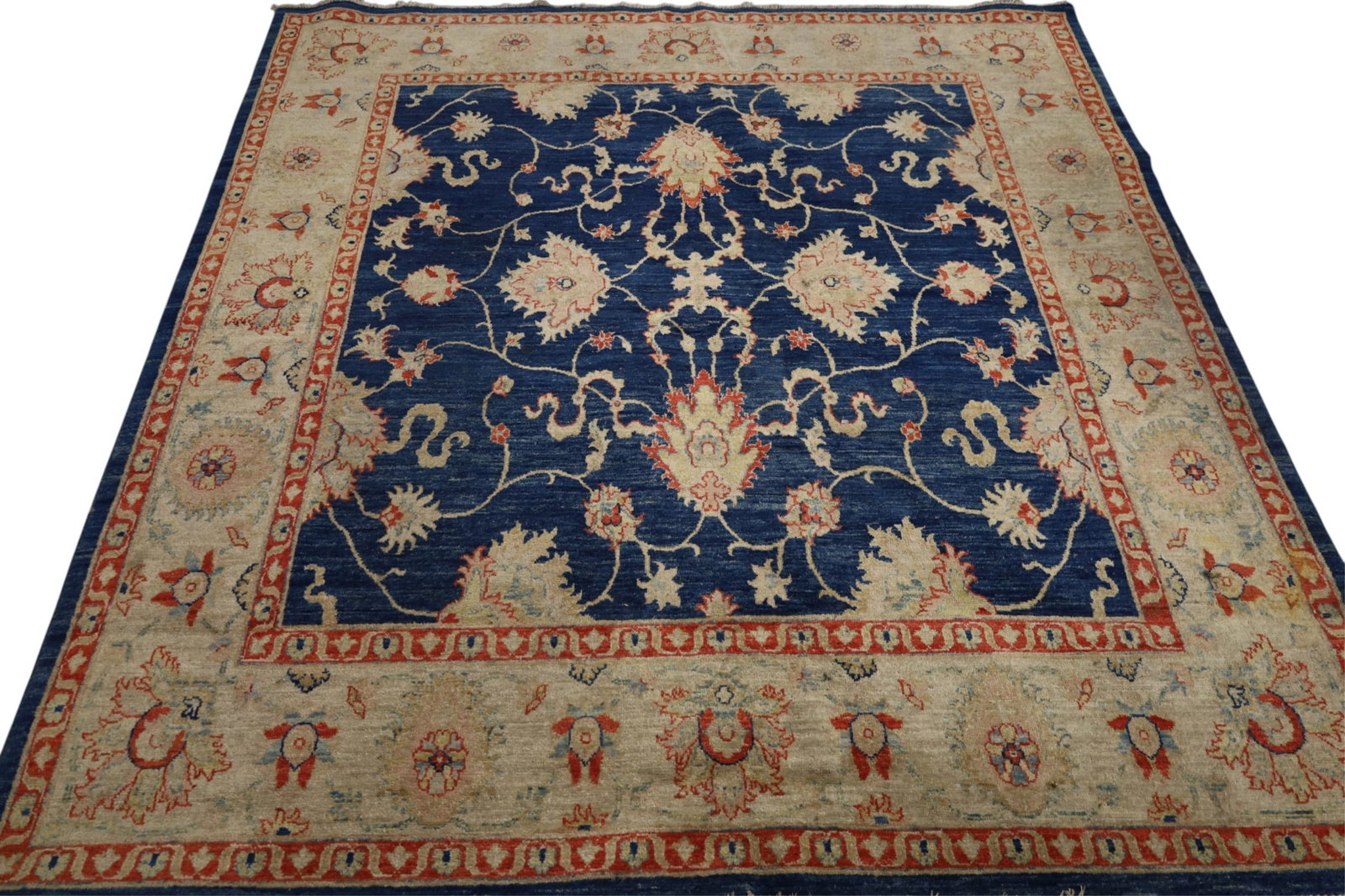 APPROX 7' 7" x 6' 9" HANDMADE WOOL RUG: HANDMADE WOOL RUG. AREAS OF LOW PILE.