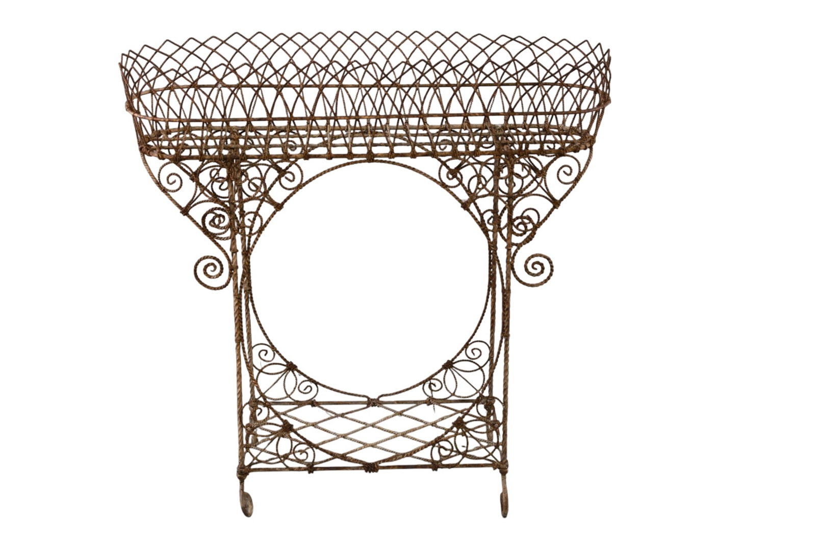 VICTORIAN WIRE PLANTER: TWISTED WIRE PLANTER, SOME RUST. 34" W x 10" D x 34" H. THIS ITEM EXCEEDS SIZE, WEIGHT, AND OR FRAGILITY LIMITATIONS FOR IN HOUSE SHIPPING, MUST BE PICKED UP IN HOUSE OR SHIPPED VIA 3RD PARTY SHIPPER.
