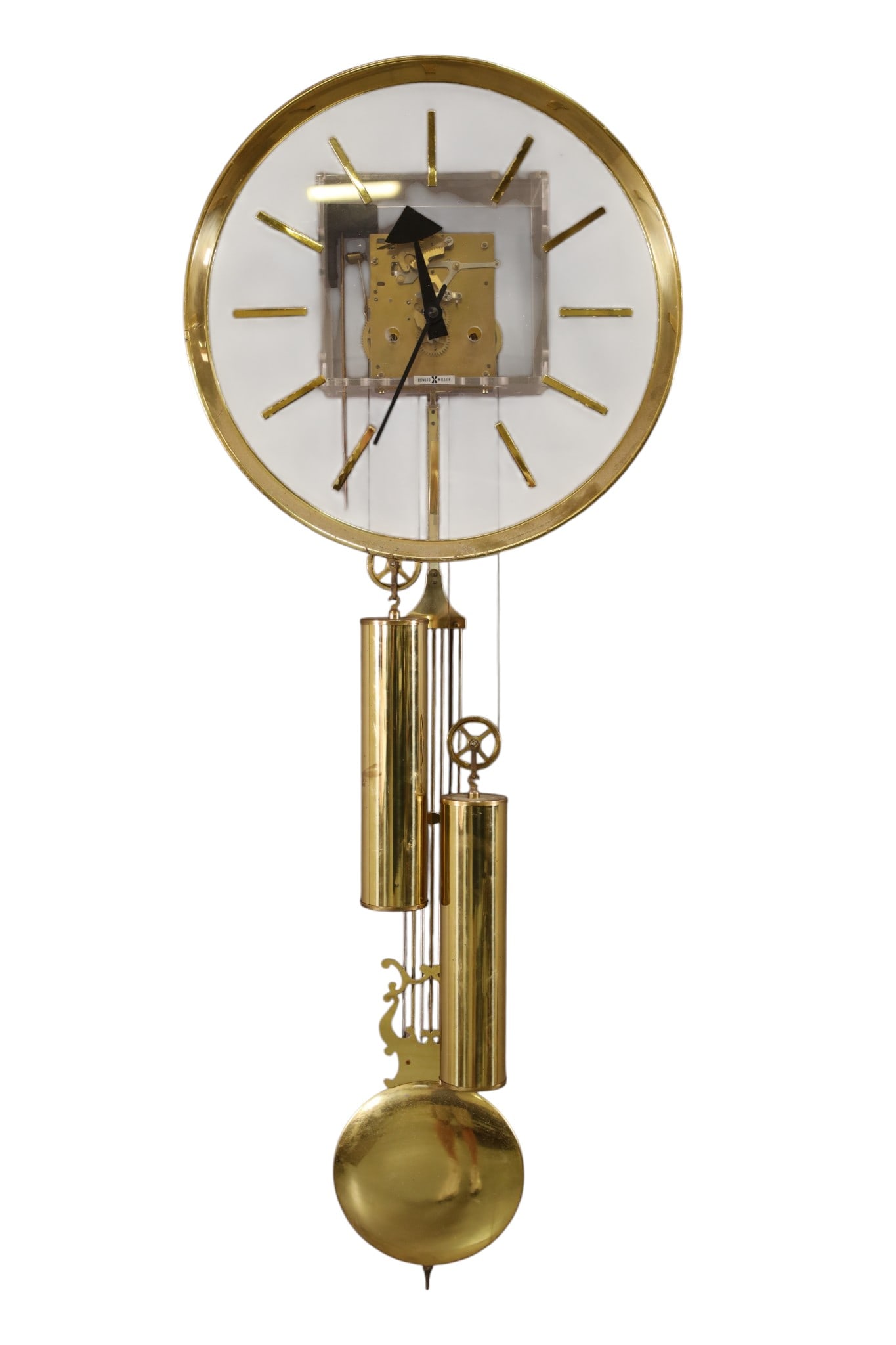 HOWARD MILLER WALL CLOCK: 2 WEIGHT ACRYLIC HOWARD MILLER WALL CLOCK, WEIGHTS WIRES ARE UNATTACHED. ALL CLOCKS ARE SOLD AS IS WE DO NOT GUARANTEE WORKING ORDER. THIS ITEM EXCEEDS SIZE, WEIGHT, AND OR FRAGILITY LIMITATIONS FOR