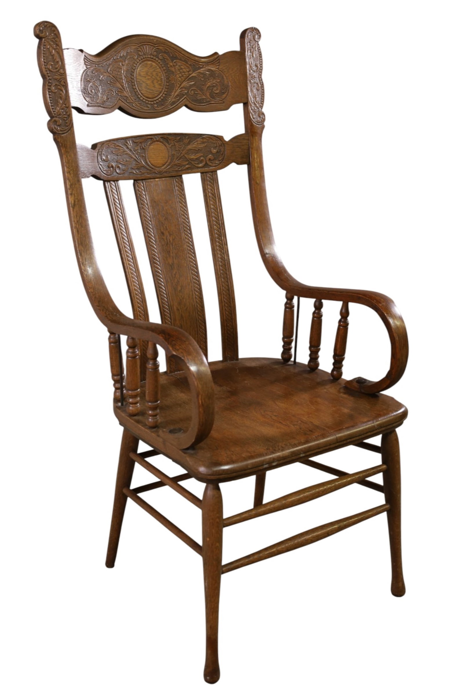 PRESSED BACK ARMCHAIR: LARGE AMERICAN OAK PRESSED BACK ARMCHAIR, 22" W x 24" D x 47" H. THIS ITEM EXCEEDS SIZE, WEIGHT, AND/OR FRAGILITY LIMITATIONS FOR IN HOUSE SHIPPING, MUST BE PICKED UP IN HOUSE OR SHIPPED VIA 3rd