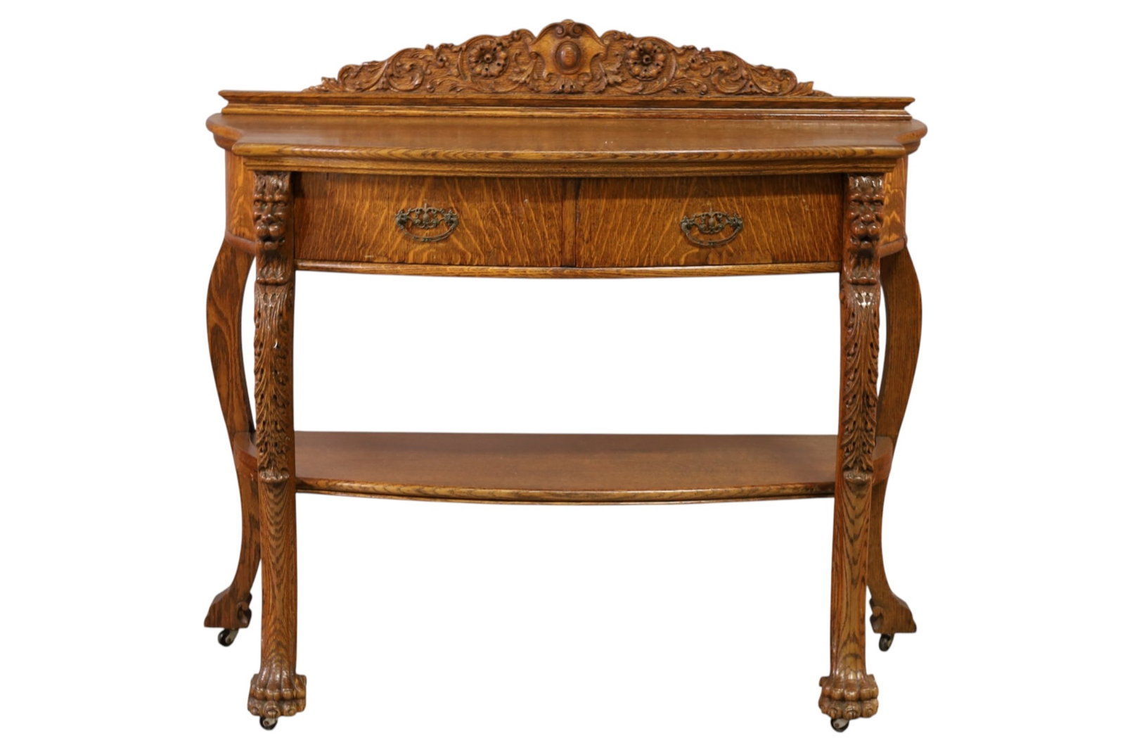 HIGHLY CARVED LION OAK SERVER: AMERICAN OAK SERVER, TWO TIER WITH LARGE SINGLE DRAWER, IN THE STYLE OF RJ HORNER. 48" W x 21" D x 44" H. THIS ITEM EXCEEDS SIZE, WEIGHT, AND/OR FRAGILITY LIMITATIONS FOR IN HOUSE SHIPPING, MUST BE PI