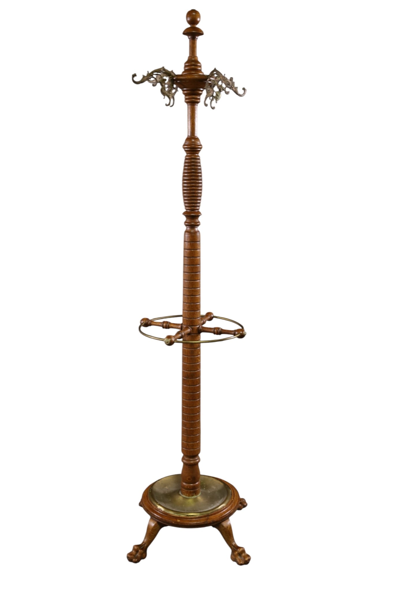 VICTORIAN OAK HAT RACK: AMERICAN OAK CLAW FOOT HAT RACK WITH BRASS HOOKS AND TRAY. 70" H. THIS ITEM EXCEEDS SIZE, WEIGHT, AND/OR FRAGILITY LIMITATIONS FOR IN HOUSE SHIPPING, MUST BE PICKED UP IN HOUSE OR SHIPPED VIA 3rd