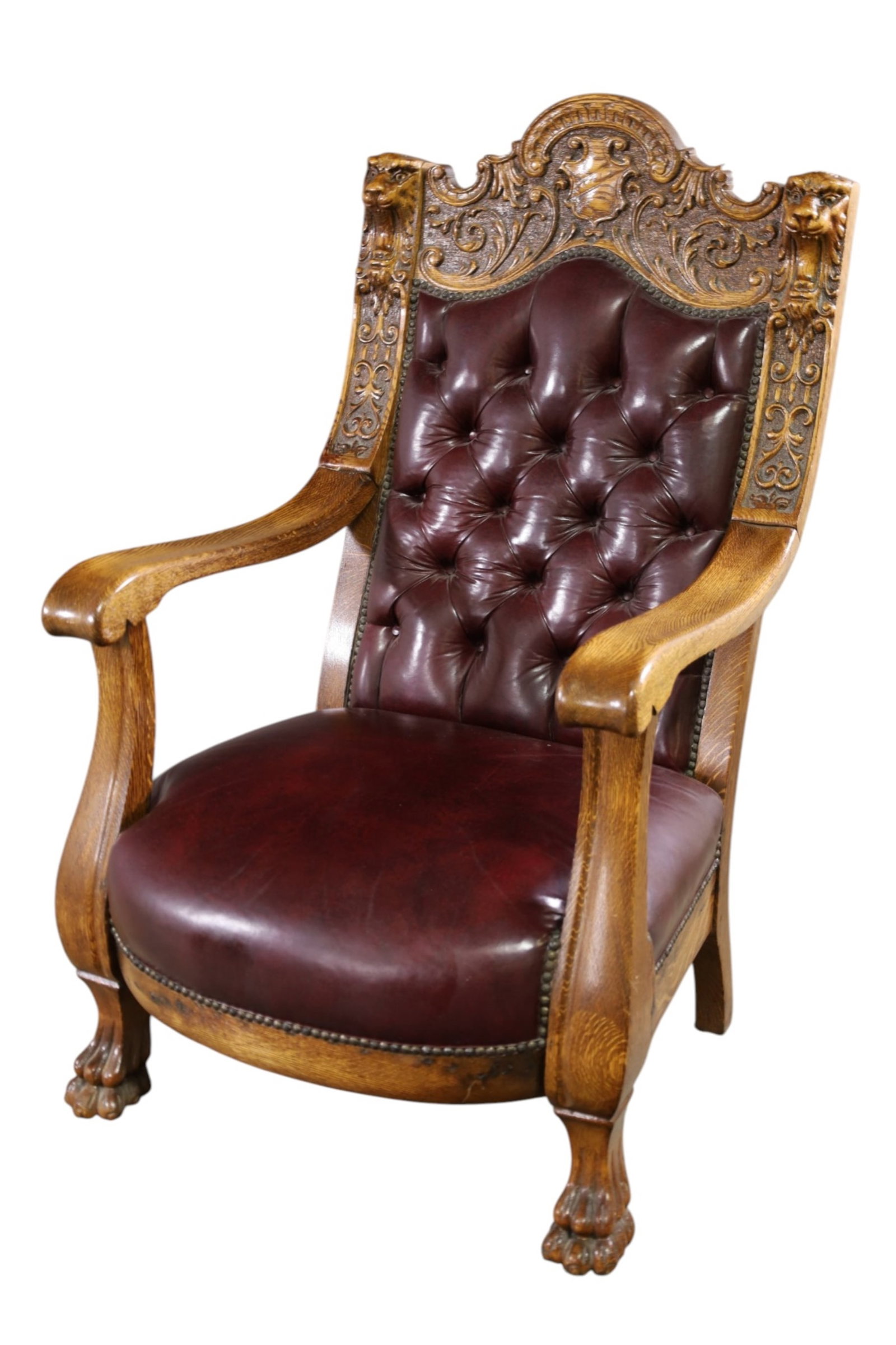 HIGHLY CARVED OAK PARLOR CHAIR: LARGE HIGHLY CARVED OAK PARLOR CHAIR, REPAIR TO ARM, 27" W x 30" D x 47" H. THIS ITEM EXCEEDS SIZE, WEIGHT, AND/OR FRAGILITY LIMITATIONS FOR IN HOUSE SHIPPING, MUST BE PICKED UP IN HOUSE OR SHIPPED