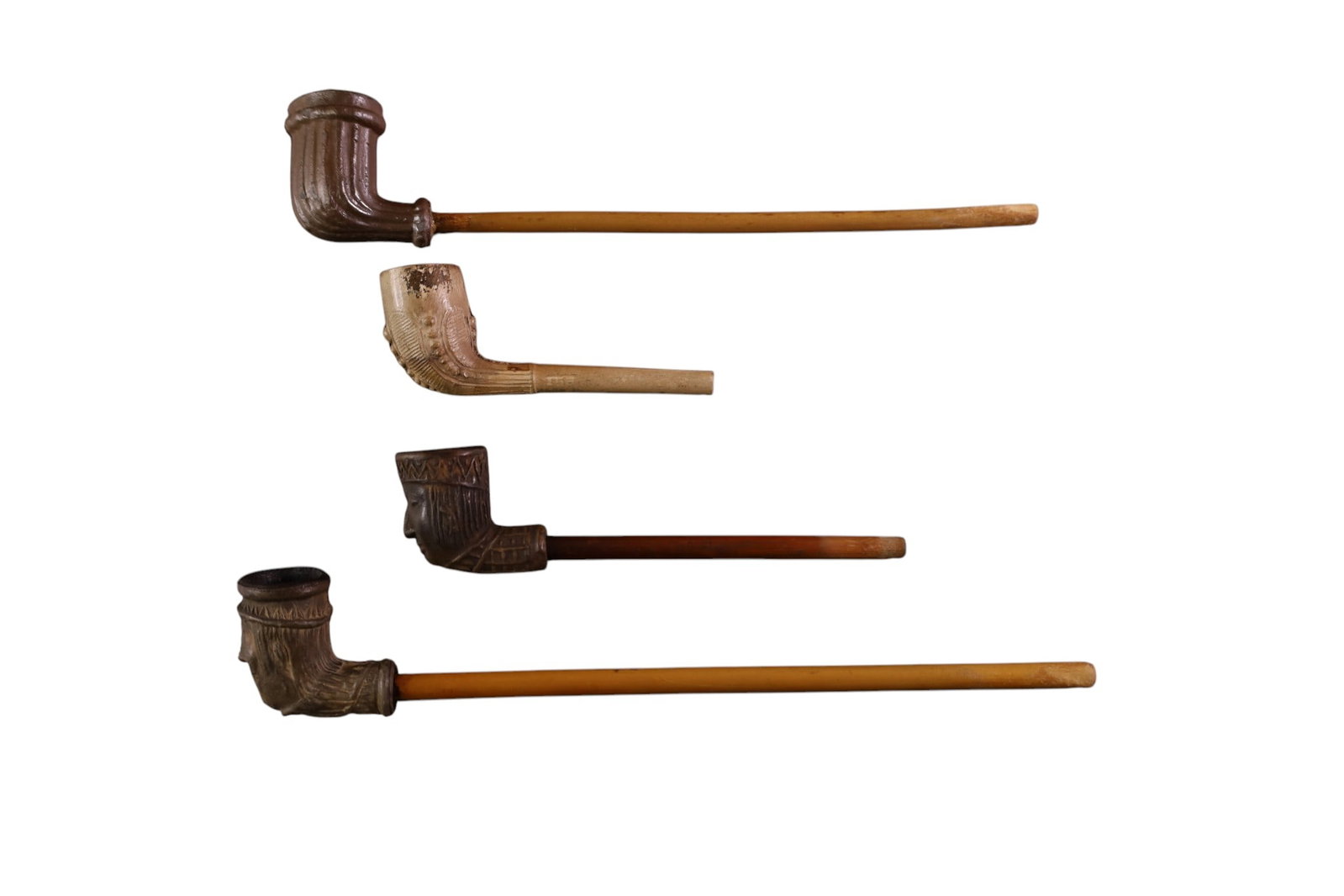 4 ANTIQUE PIPES: CARVED FIGURAL PIPES, 4" - 9" L.