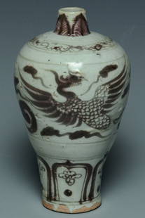 A YUAN DYNASTY UNDERGLAZED RED PORCELAIN VASE: A Yuan Dynasty Underglazed Red Porcelain Vase. Dimensions: 6 1/4 x 3 1/2 in.