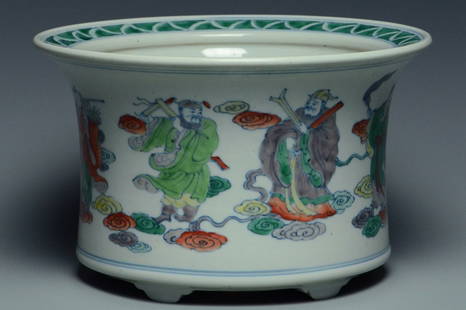 A QING DYNASTY DOUCAI EIGHT IMMORTALS PLANTER: A Qing Dynasty Doucai Eight Immortals Planter. Dimensions: 9 3/4 x 6 in.