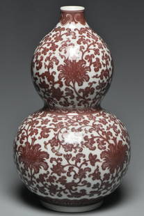 A QING DYNASTY UNDERGLAZED RED VASE: A Qing Dynasty Underglazed Red Vase. Dimensions: 10 x 6 in. Provenance: From the collection of Charles George(1898-1983). Manager of Sir Victor Sassoon's Empire in China, Mr Charles George and