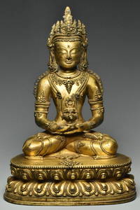 MING DYNASTY GILT BRONZE FIGURE OF BUDDHA 15TH C