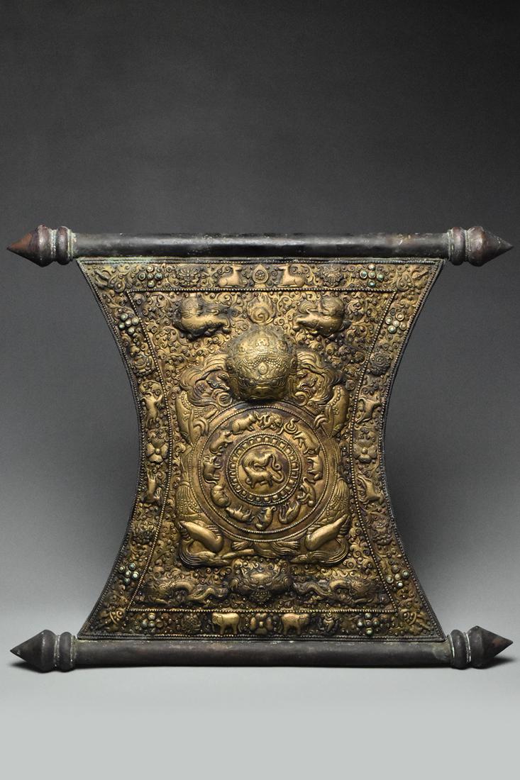 A MING DYNASTY GILT COPPER REPOUSSE PLAQUE (1 of 20)