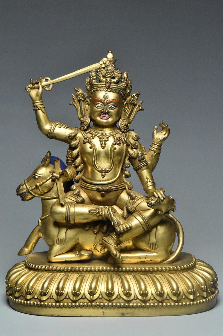A MING DYNASTY GILT BRONZE FIGURE OF SRI DEVI (1 of 11)