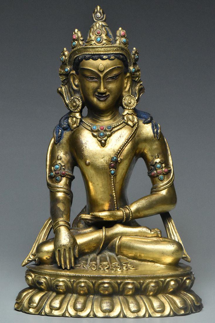 A QING DYNASTY GILT BRONZE FIGURE OF AMITAYUS (1 of 11)