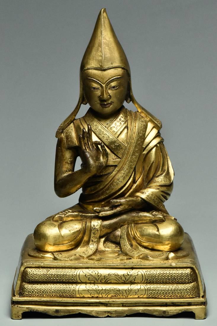 A SINO-TIBETAN GILT BRONZE FIGURE OF TSONGKAPA (1 of 14)