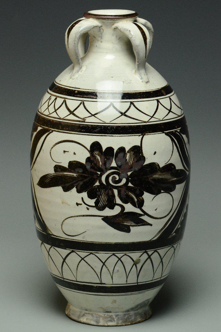 A YUAN DYNASTY PAINTED CIZHOU WINE JAR: A Yuan Dynasty Painted Cizhou Wine Jar. Dimensions: 10 1/2 x 5 1/2 in. High resolution pictures can be found at https://file.ac/21euCO1oZvCrLvmDkLZ4Xw/