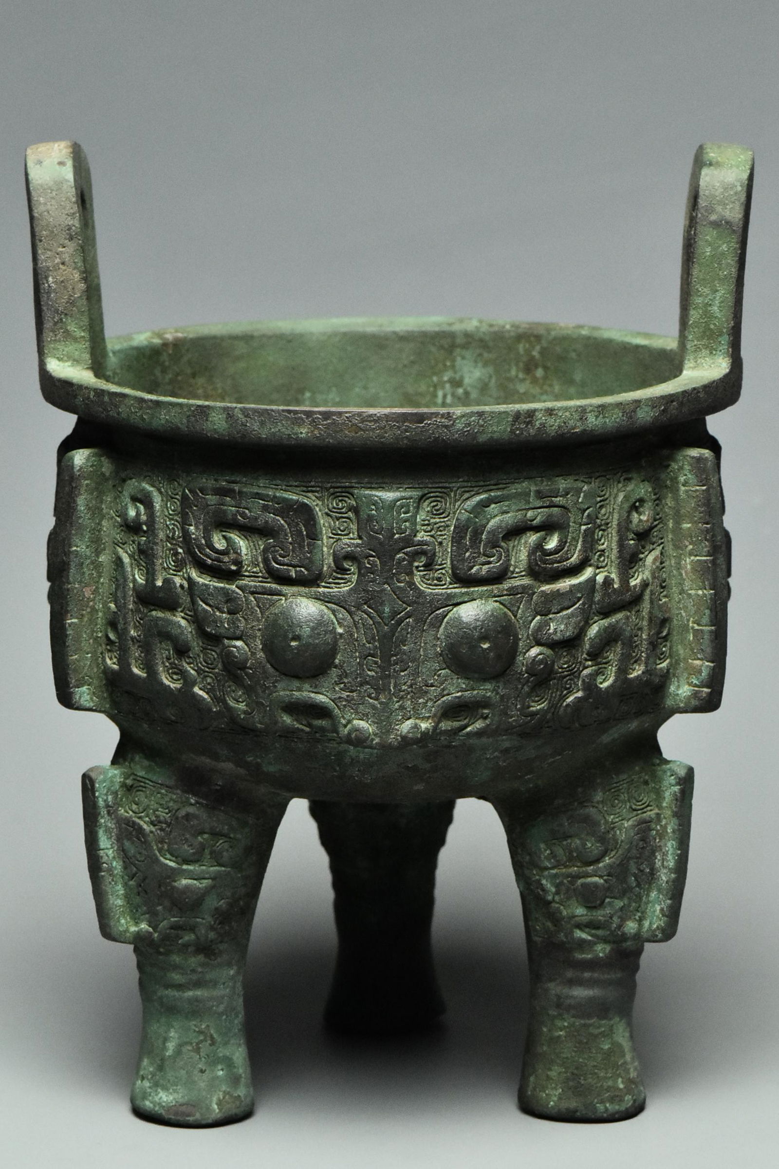A SHANG DYNASTY BRONZE RITUAL FOOD VESSEL DING (1 of 14)
