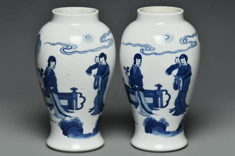 A PAIR OF BLUE AND WHITE FIGURE SUBJECT VASES: A PAIR OF BLUE AND WHITE FIGURE SUBJECT VASES. Dimensions: 6 1/2 x 4 in. High resolution pictures can be found at https://file.ac/231bYay665Q/