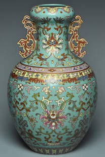 A FAMILLE ROSE VASE QIANLONG MARK AND PERIOD: A FAMILLE ROSE VASE QIANLONG MARK AND PERIOD. Dimensions: 11 x 7 in. Provenance: From the collection of Charles George(1898-1983). Manager of Sir Victor Sassoon's Empire in China, Mr Charles George